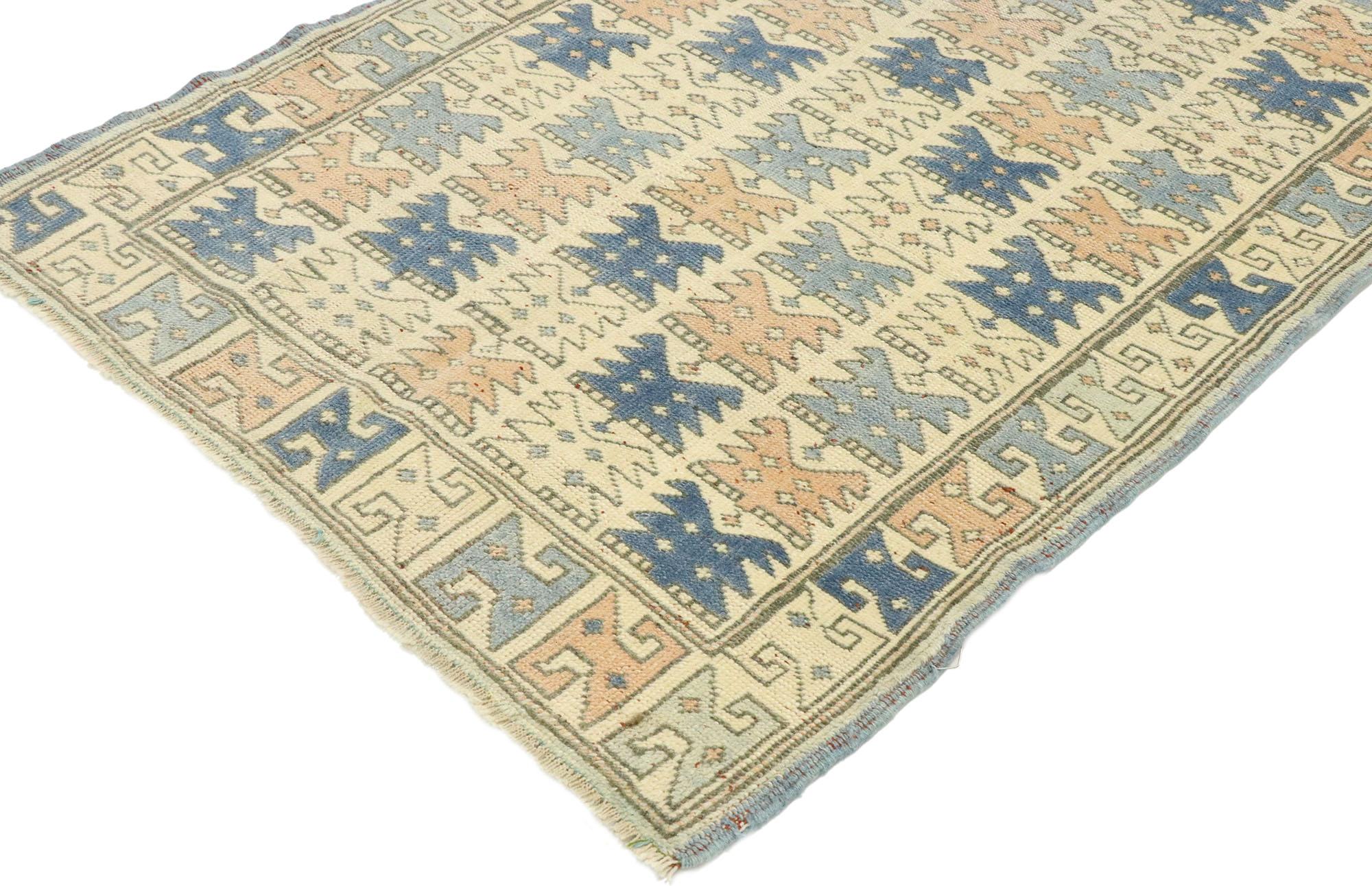 53144, vintage Turkish Oushak runner with Modern Georgian style. With its well-balanced symmetry and hues in harmony, this hand knotted wool vintage Turkish Oushak runner beautifully embodies a romantic Georgian style. The abrashed beige field