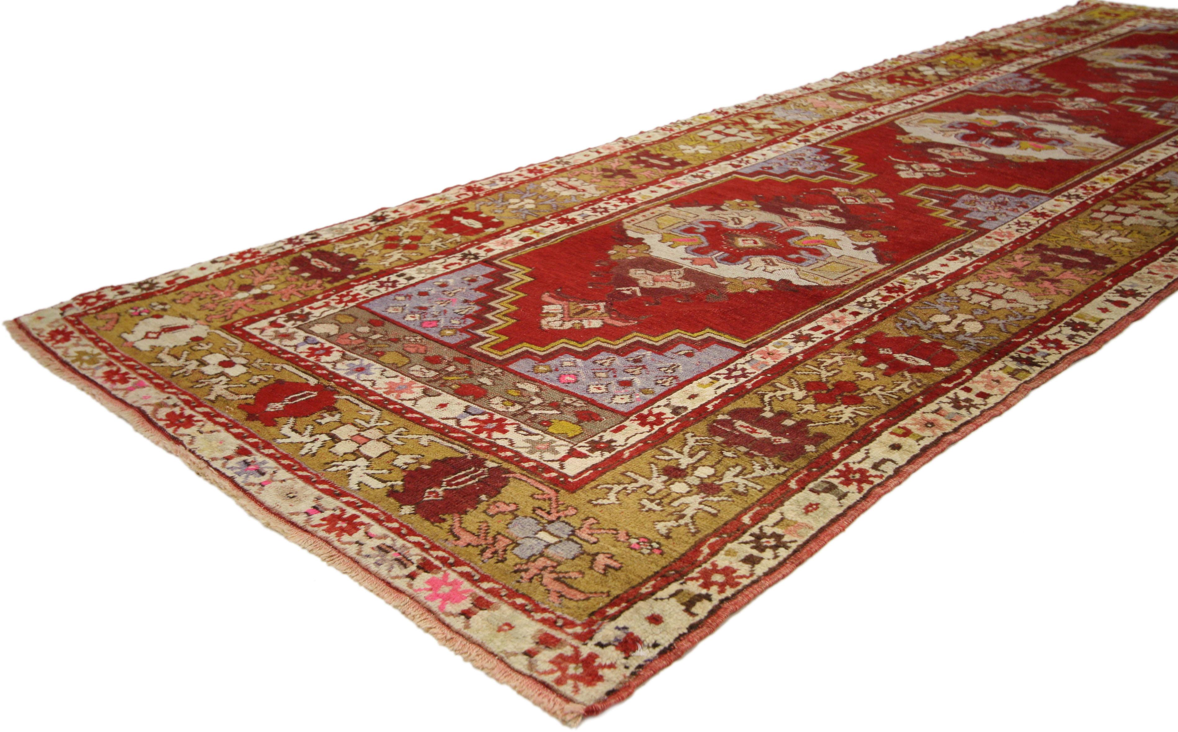 73852 Vintage Turkish Oushak runner with Modern Tribal style, Hallway runner. This vintage Turkish Oushak carpet runner features a triple medallion with cartouche finials in an open red field surrounded by a modern tribal style border. Rendered in a