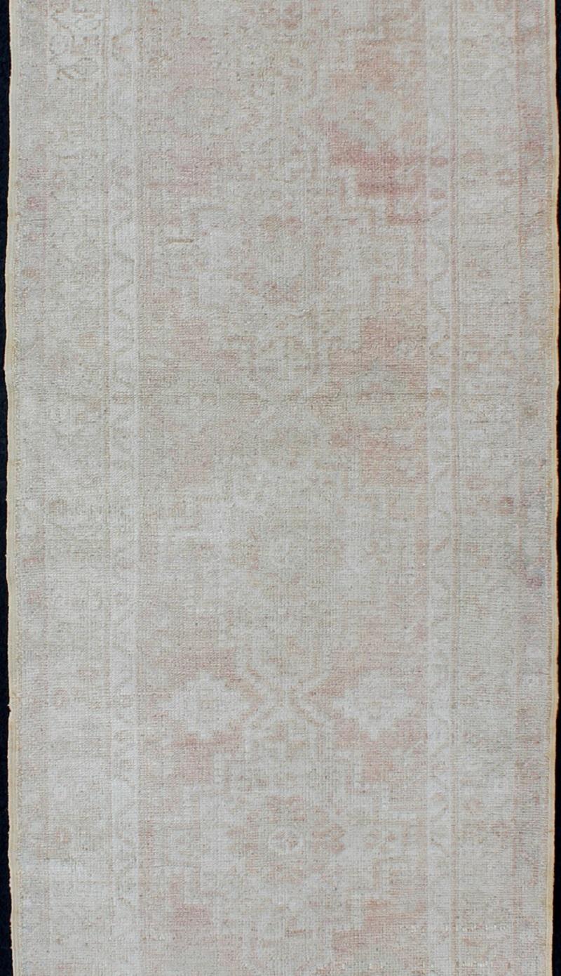 Hand-Knotted Vintage Turkish Oushak Runner with Multi-Medallion Design in Muted Color Palette For Sale