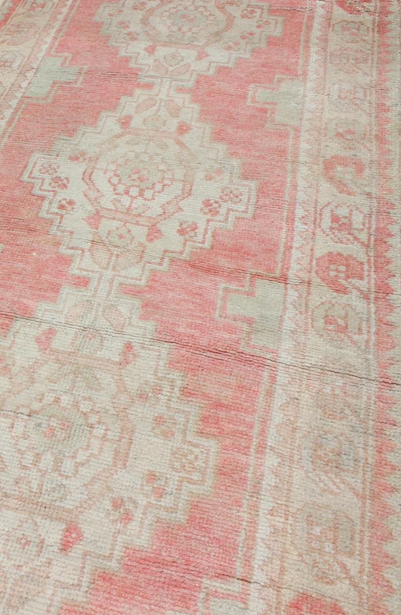 Vintage Turkish Oushak Runner with Multi-Medallion Design in Muted Red and Ivory For Sale 1