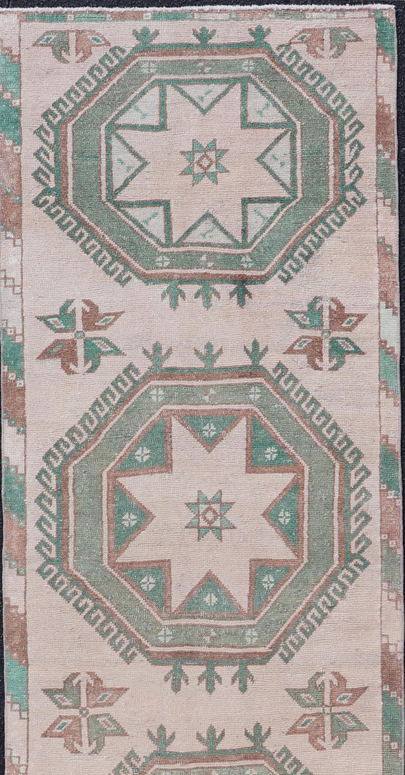 Vintage Turkish Oushak Runner with Repeating Geometric Design in Tan and Green In Good Condition For Sale In Atlanta, GA