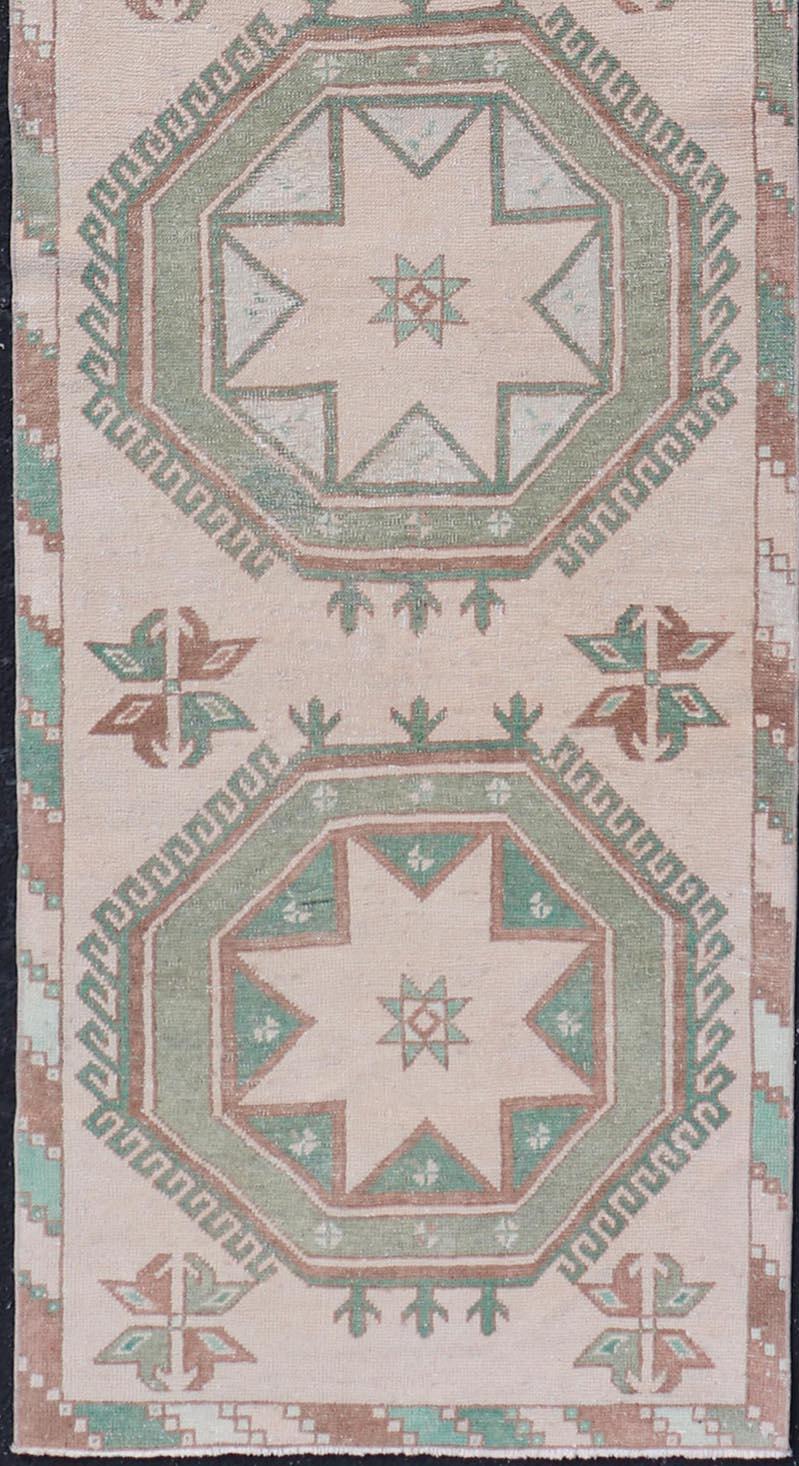 Wool Vintage Turkish Oushak Runner with Repeating Geometric Design in Tan and Green For Sale