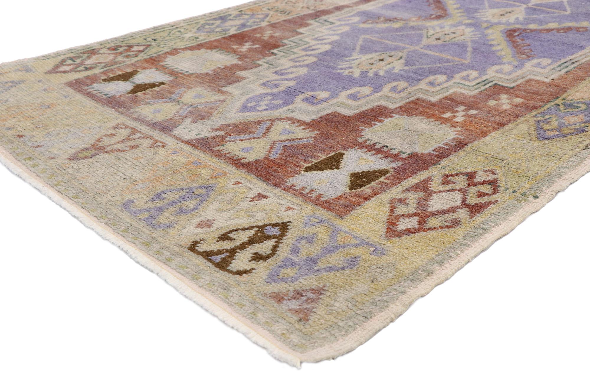 52757, vintage Turkish Oushak runner with rustic French and warm Georgian style. With its soft and delicate color palette and bold geometric form, this hand knotted wool vintage Turkish Oushak runner embodies both rustic French and Georgian style.