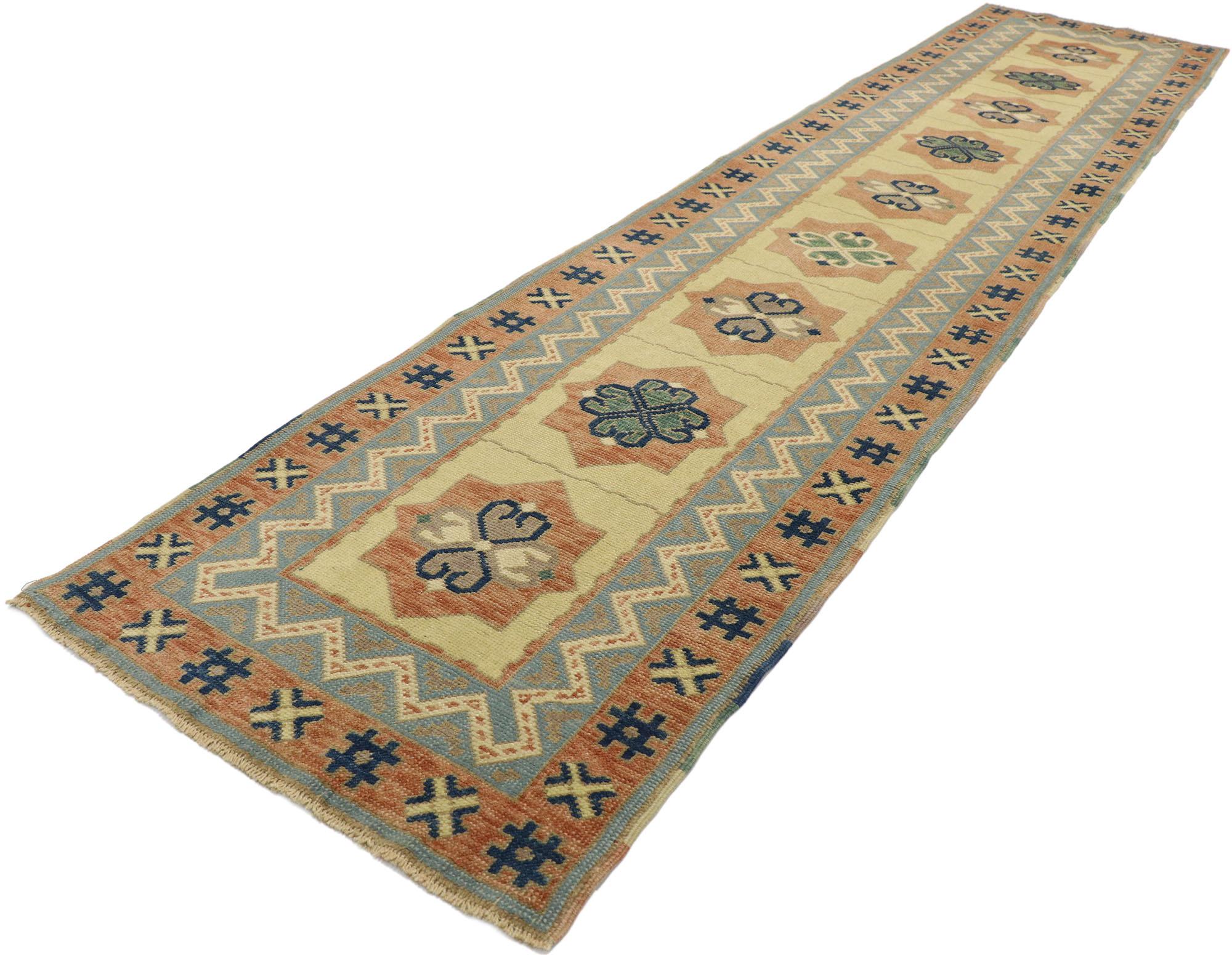 53214, vintage Turkish Oushak Runner with Rustic Southwestern Desert style. Imbued with sunbaked earthy hues and rustic sensibility, this hand knotted wool vintage Turkish Oushak runner beautifully embodies a southwestern desert style. The abrashed