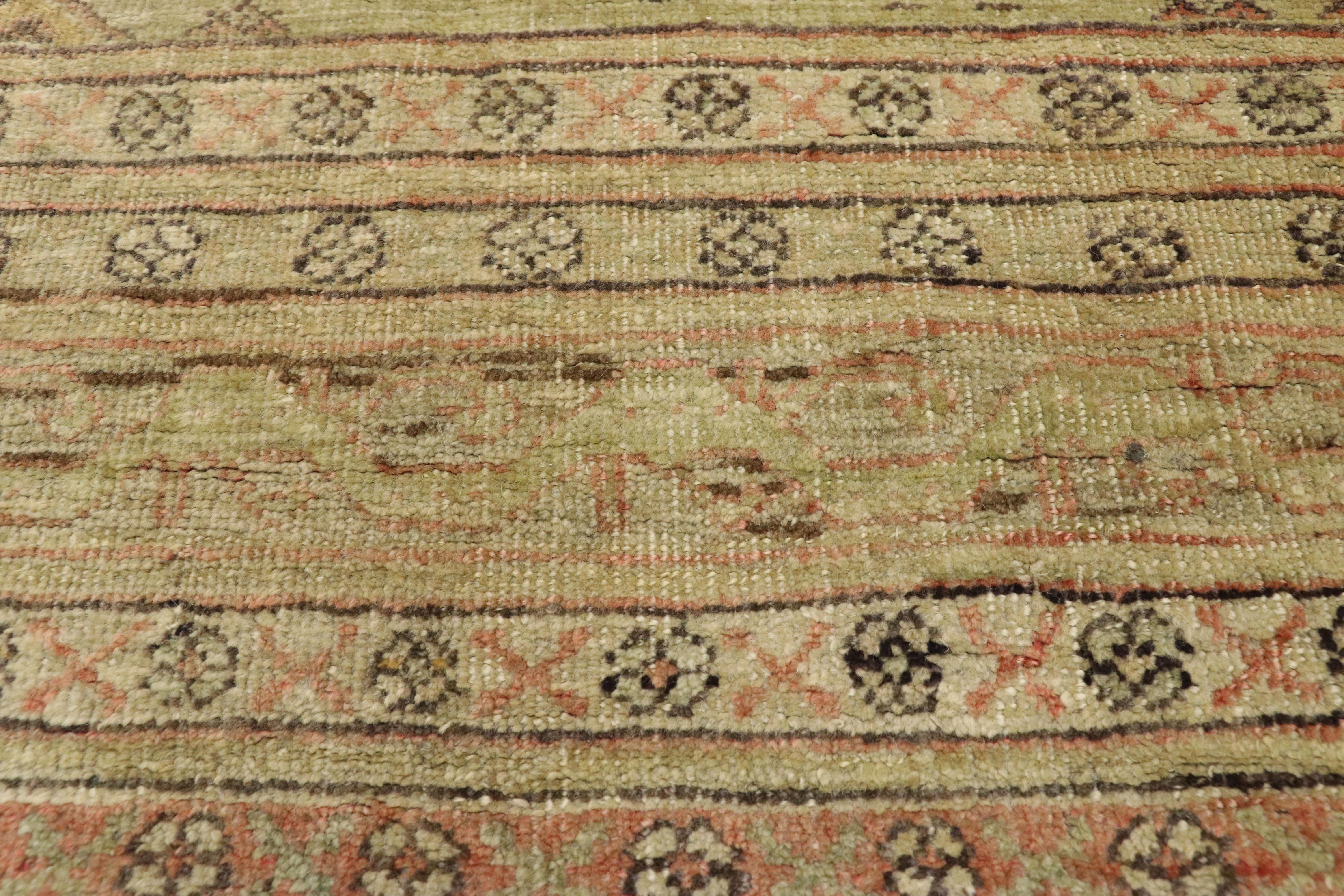 20th Century Vintage Turkish Oushak Runner with Soft Muted Colors with Rustic Mission Style For Sale
