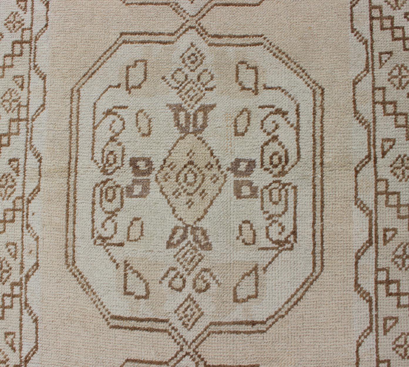Wool Vintage Turkish Oushak Runner with Stylized Three Medallion Design For Sale
