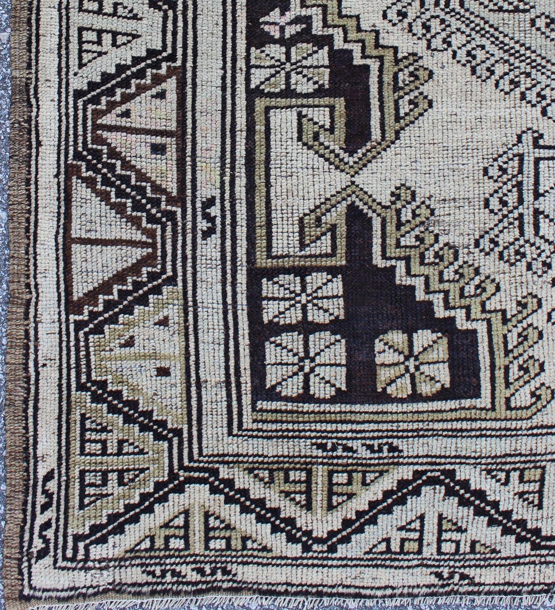 Hand-Knotted Vintage Turkish Oushak Runner with Stylized Two Large Medallion Design For Sale