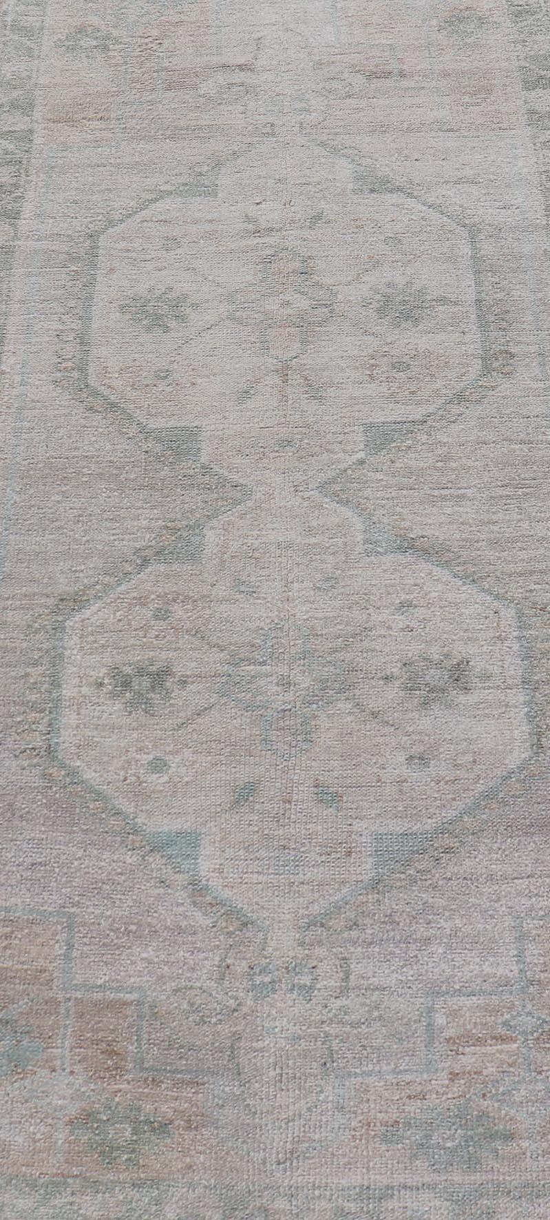 Vintage Turkish Oushak Runner with Subdued Geometric Medallions in Light Tones For Sale 3