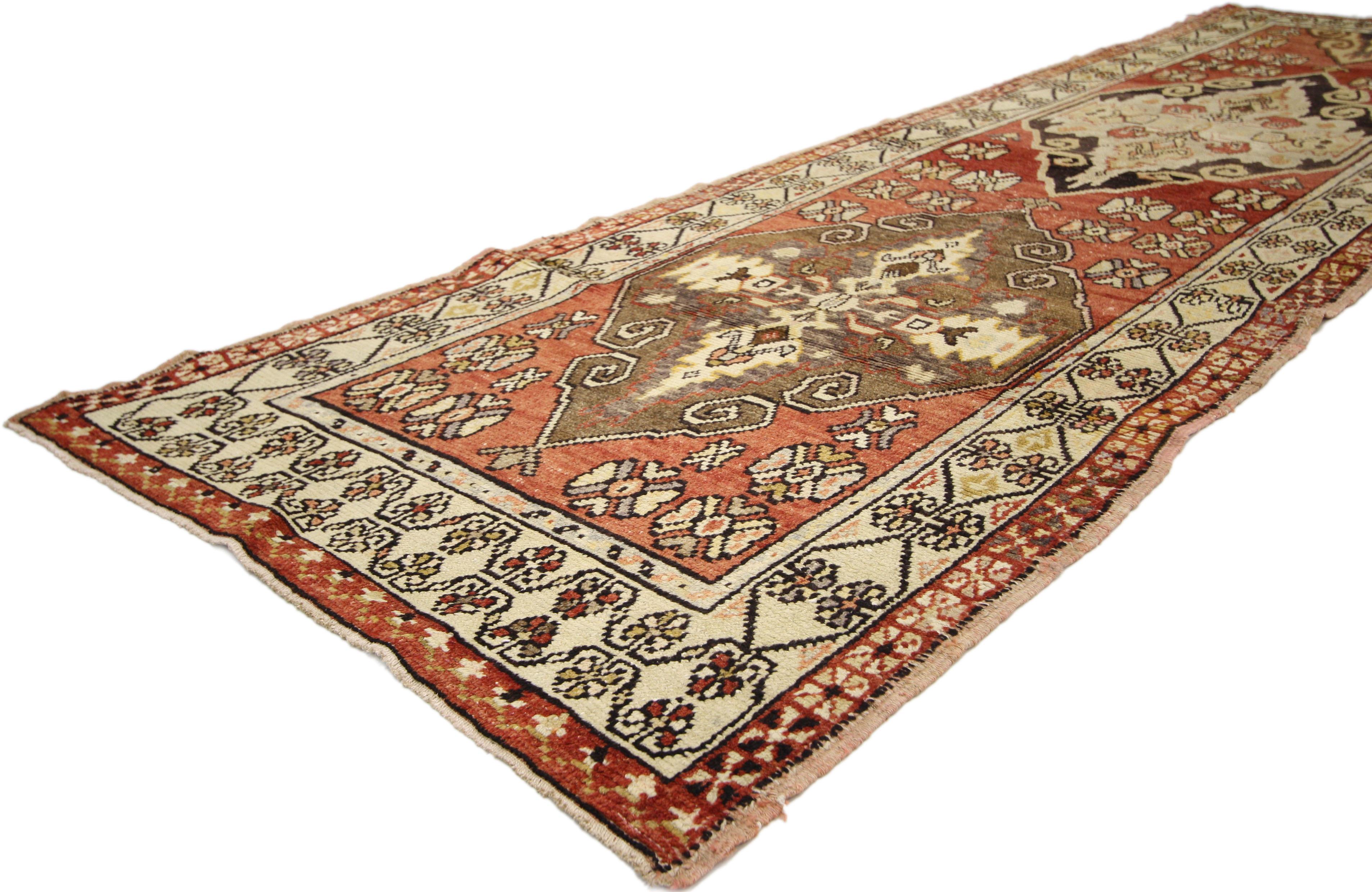 50107, vintage Turkish Oushak rug runner with traditional style. This tribal patterned Oushak runner features a double diamond lozenge design in opposite color palettes of muted crimson red, espresso, mocha brown and creamy-beige. Each lozenge