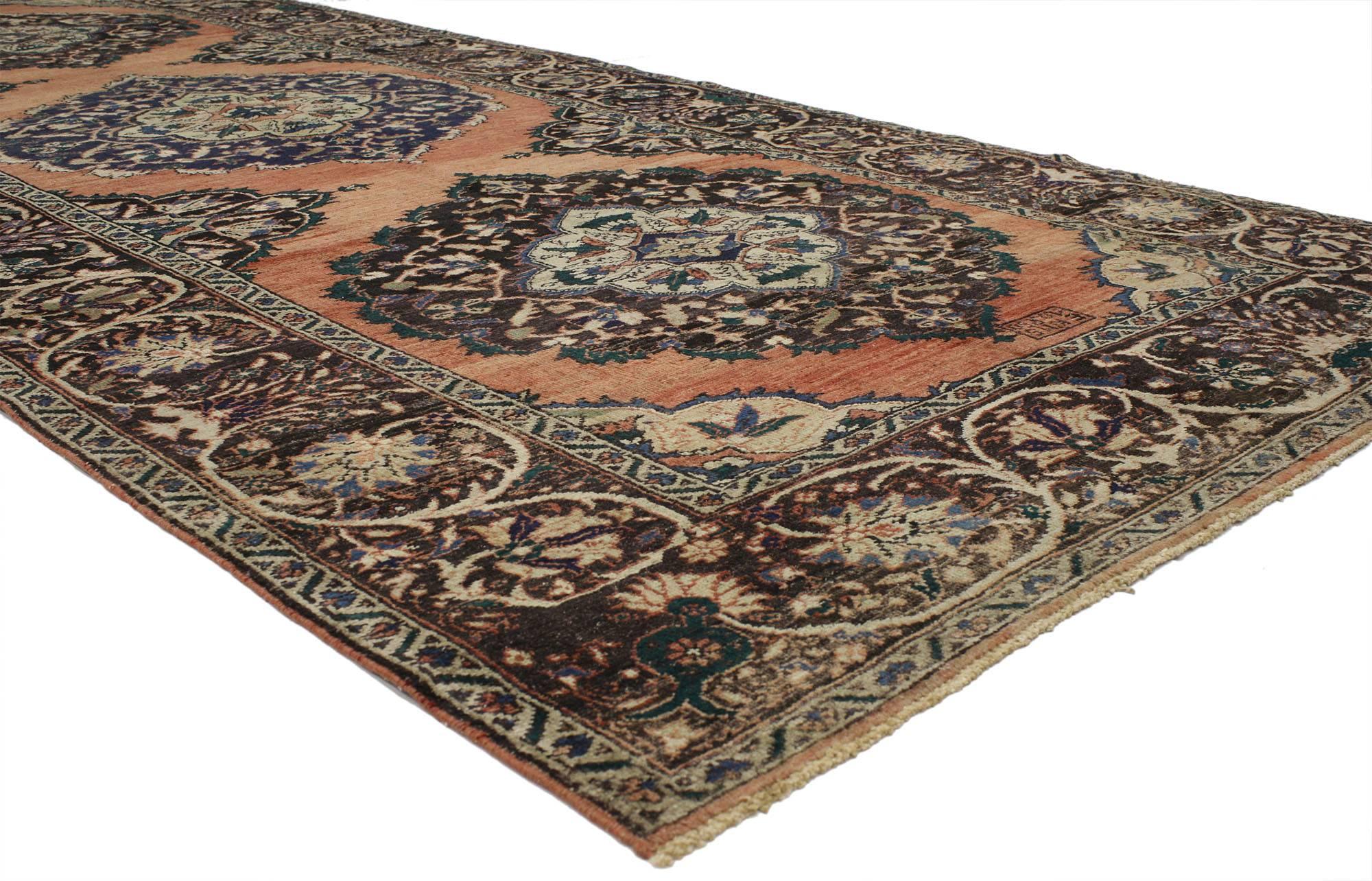 52246 Vintage Turkish Oushak Gallery Rug with Jacobean Style, Wide Hallway Runner 05'09 x 13'09. This hand-knotted wool vintage Turkish Oushak gallery rug features a floral pattern with three rounded ogival medallions with scalloped edges in an