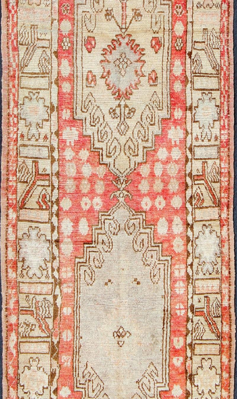 Hand-Knotted Vintage Turkish Oushak Runner with Tribal Medallion Design in Muted Red, Brown For Sale