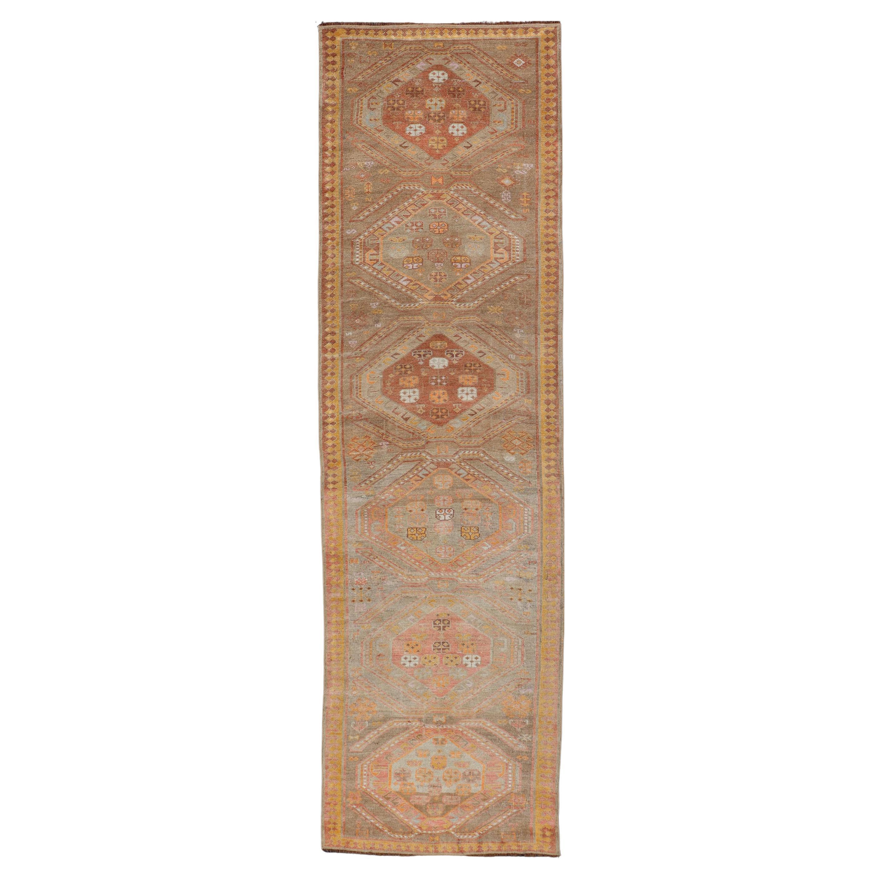 Vintage Turkish Oushak Runner with Tribal Medallions in Brown's, Yellow, and Red