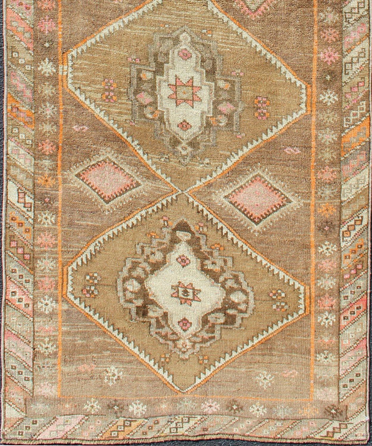 Hand-Knotted Vintage Turkish Oushak Runner with Tribal Medallions in Earthy Tones For Sale