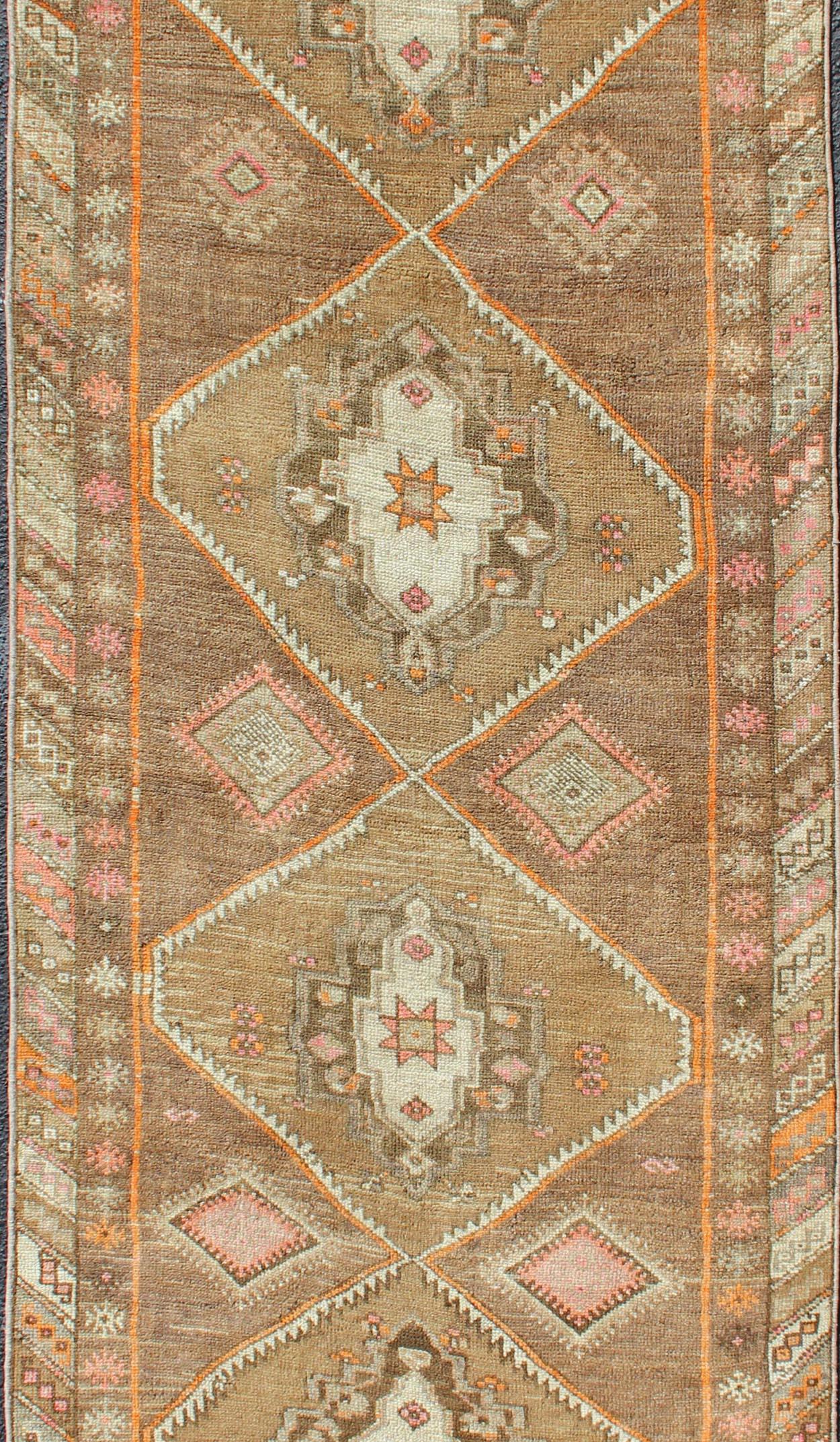 Vintage Turkish Oushak Runner with Tribal Medallions in Earthy Tones In Good Condition For Sale In Atlanta, GA