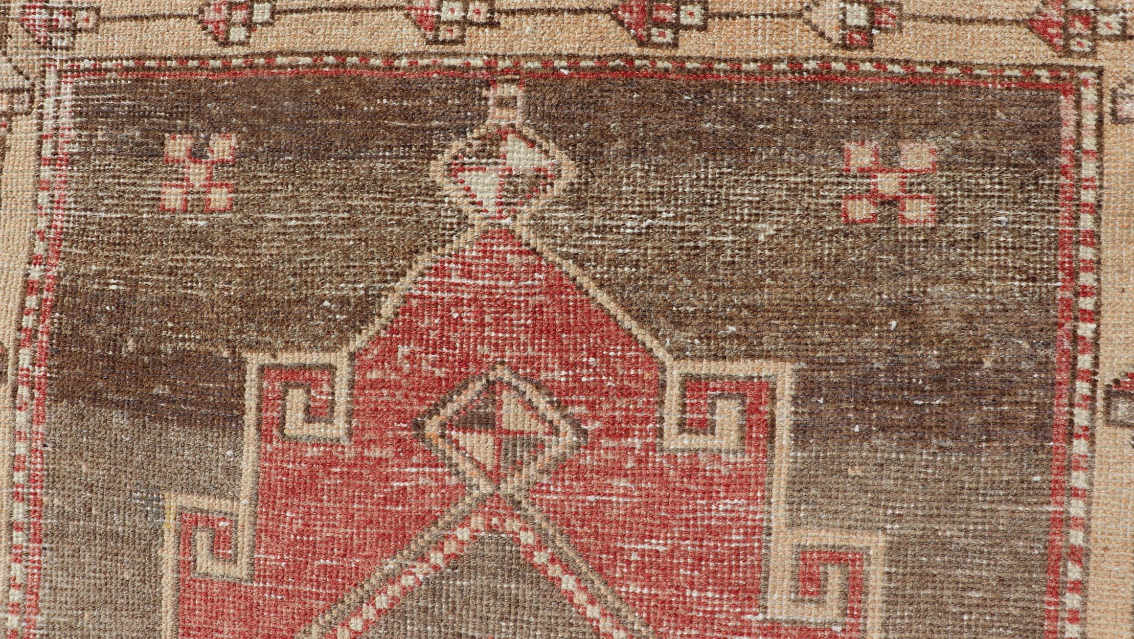 20th Century Vintage Turkish Oushak Runner with Vibrant Red and Earthy Tones 3'5