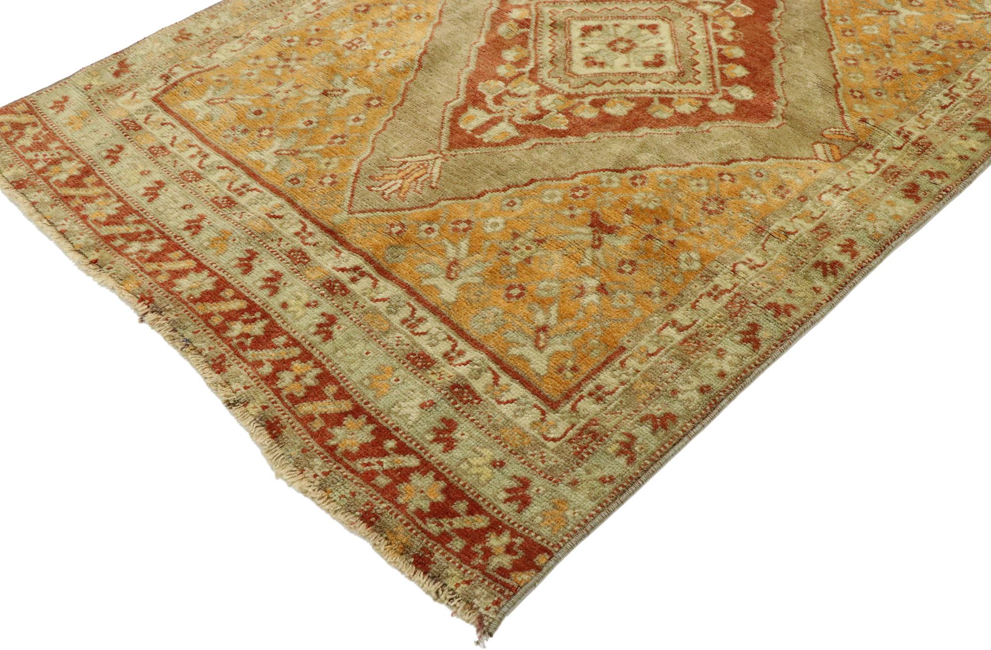 53099 vintage Turkish Oushak runner with warm Arts & Crafts style. Imbued with architectural elements of naturalistic forms in earth-tone colors, this hand knotted wool vintage Turkish Oushak runner beautifully embodies warm Arts & Crafts Style. The
