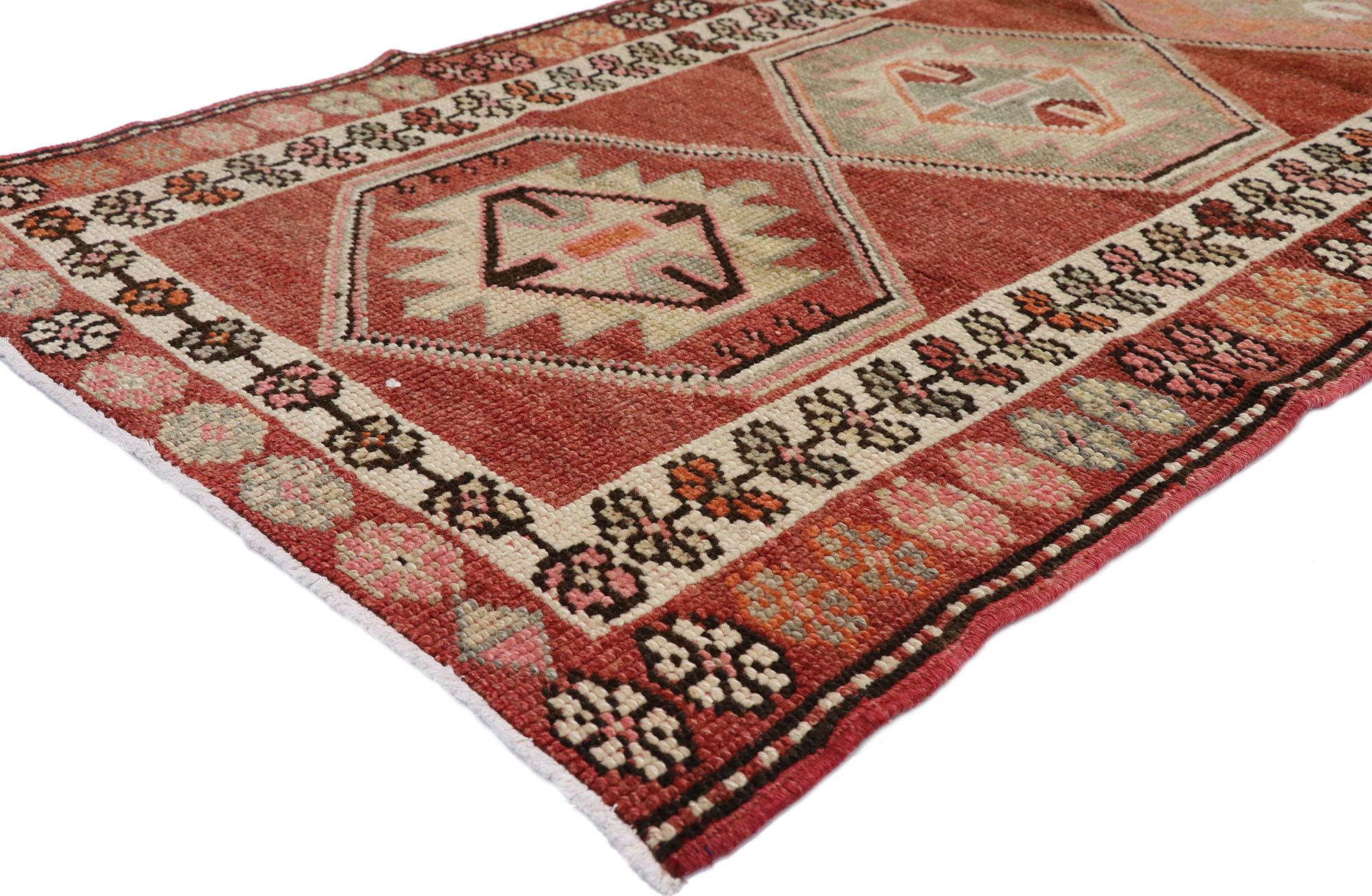 52716, vintage Turkish Oushak runner with warm Santa Fe Desert Tribal style. With its bold geometric form and Aztec flair combined with warm and vibrant colors, this hand knotted wool vintage Turkish Oushak runner manages to beautifully meld with