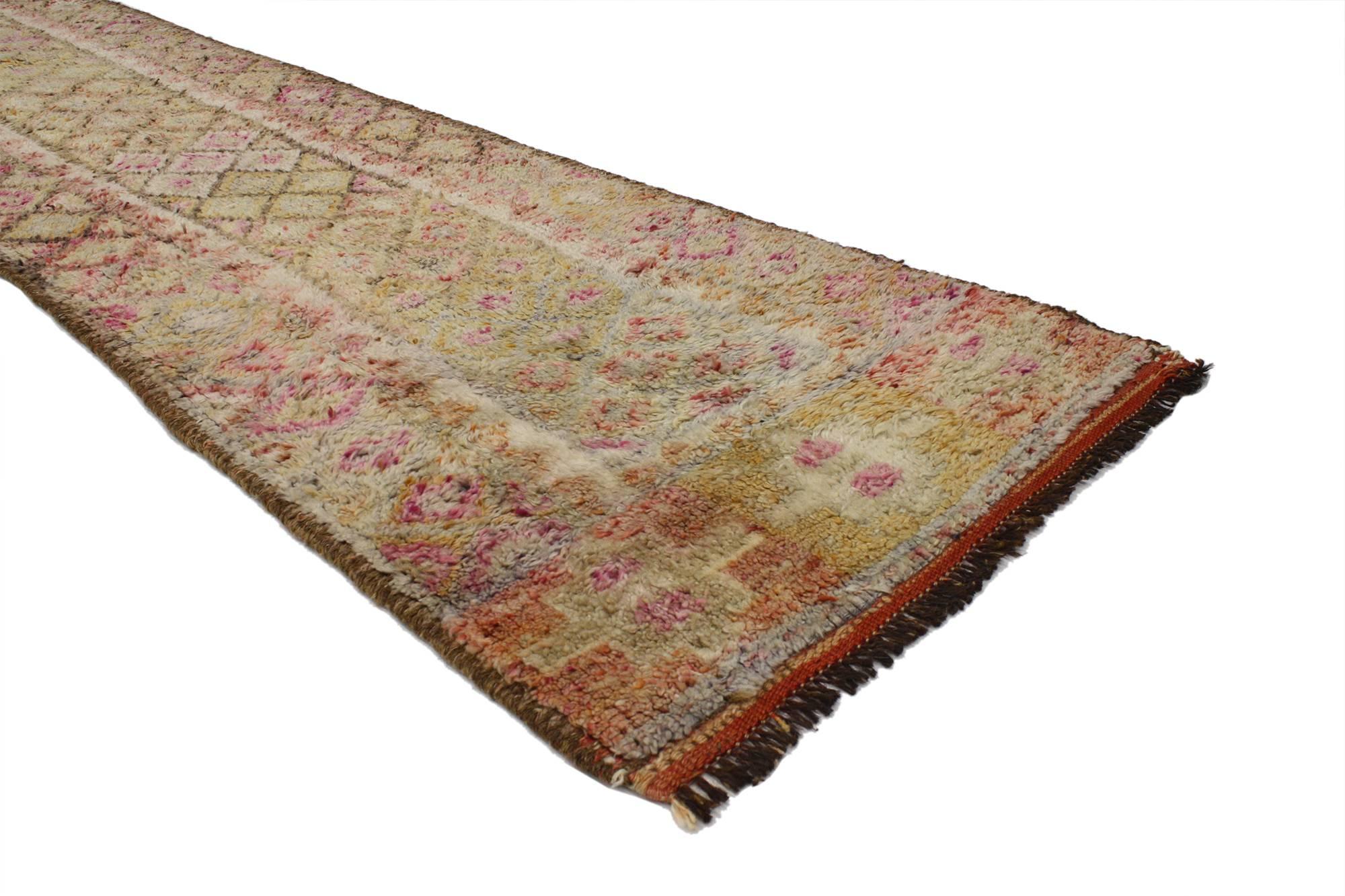 52064, vintage Turkish Oushak runner, long and narrow hallway. This hand-knotted wool vintage Turkish Oushak runner with tribal style features an allover diamond lozenge pattern in an abrashed field. A compartmental border composed of rosettes and