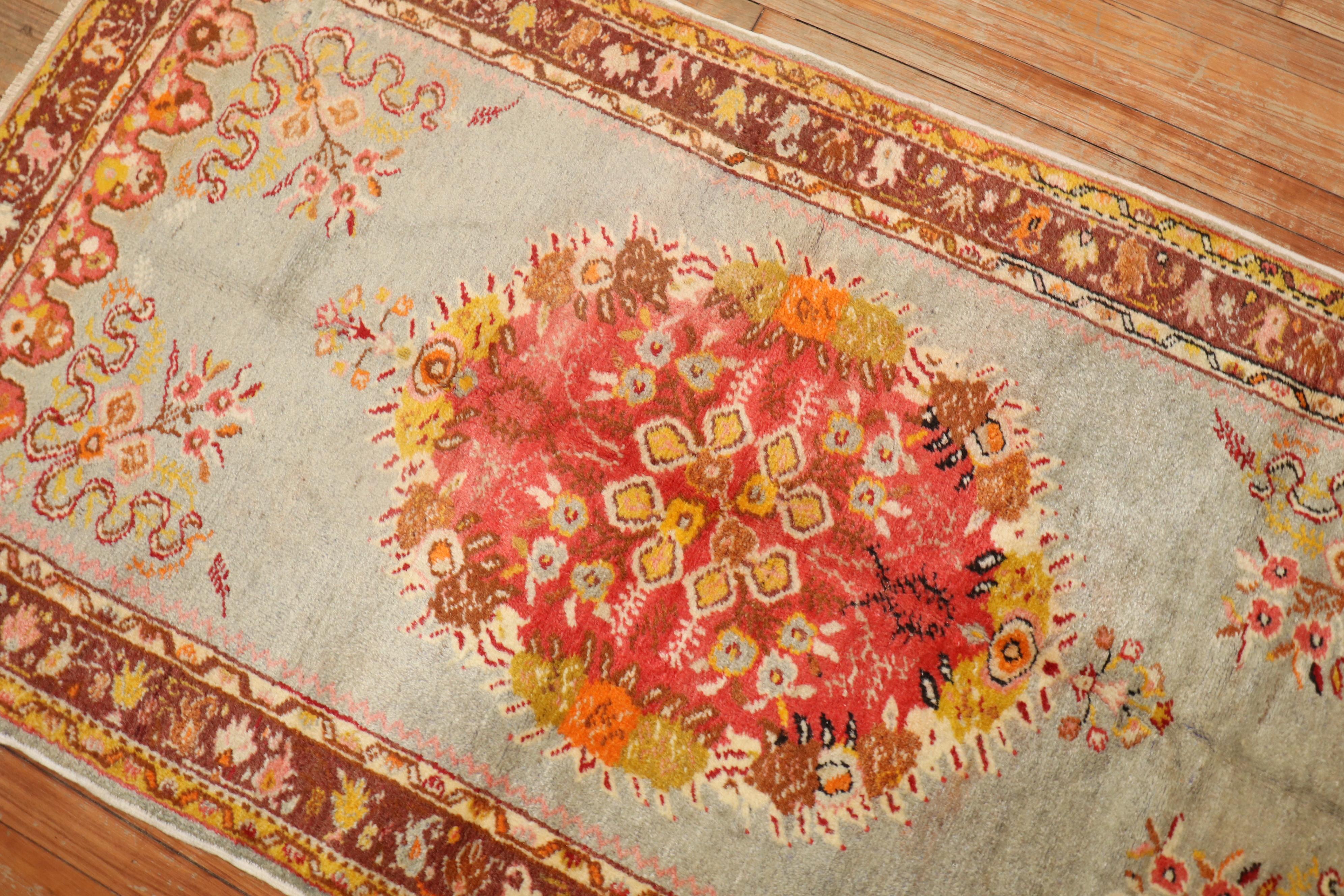 A colorful mid-20th century Turkish rug

Measures: 3'3'' x 6'.