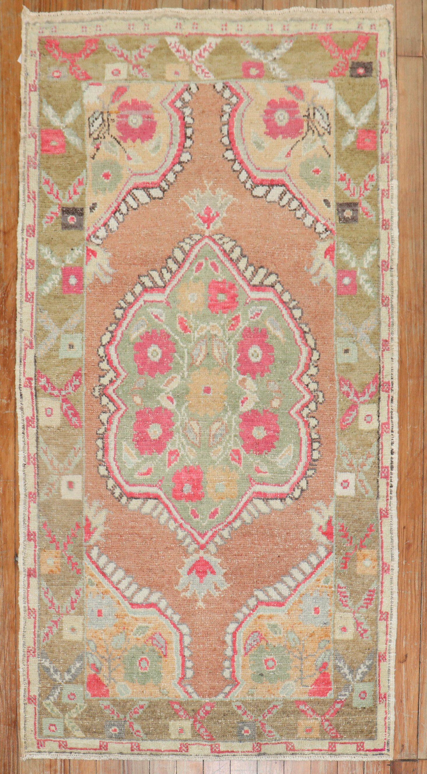 A colorful mid-20th-century Turkish throw-size rug

Measures: 2'8'' x 4'11''.