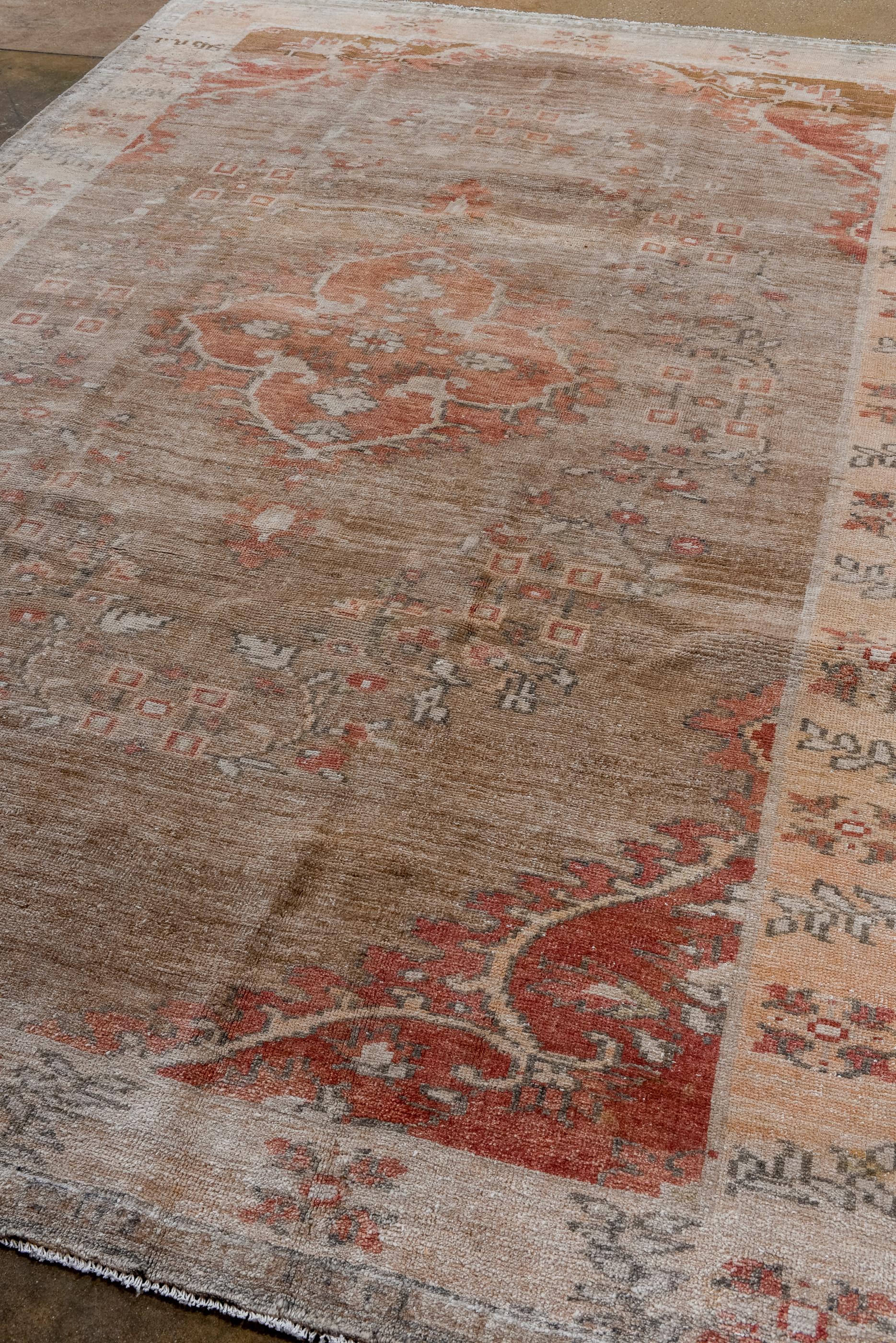Hand-Knotted Vintage Turkish Oushak with a Rust Field and Center Medallion 