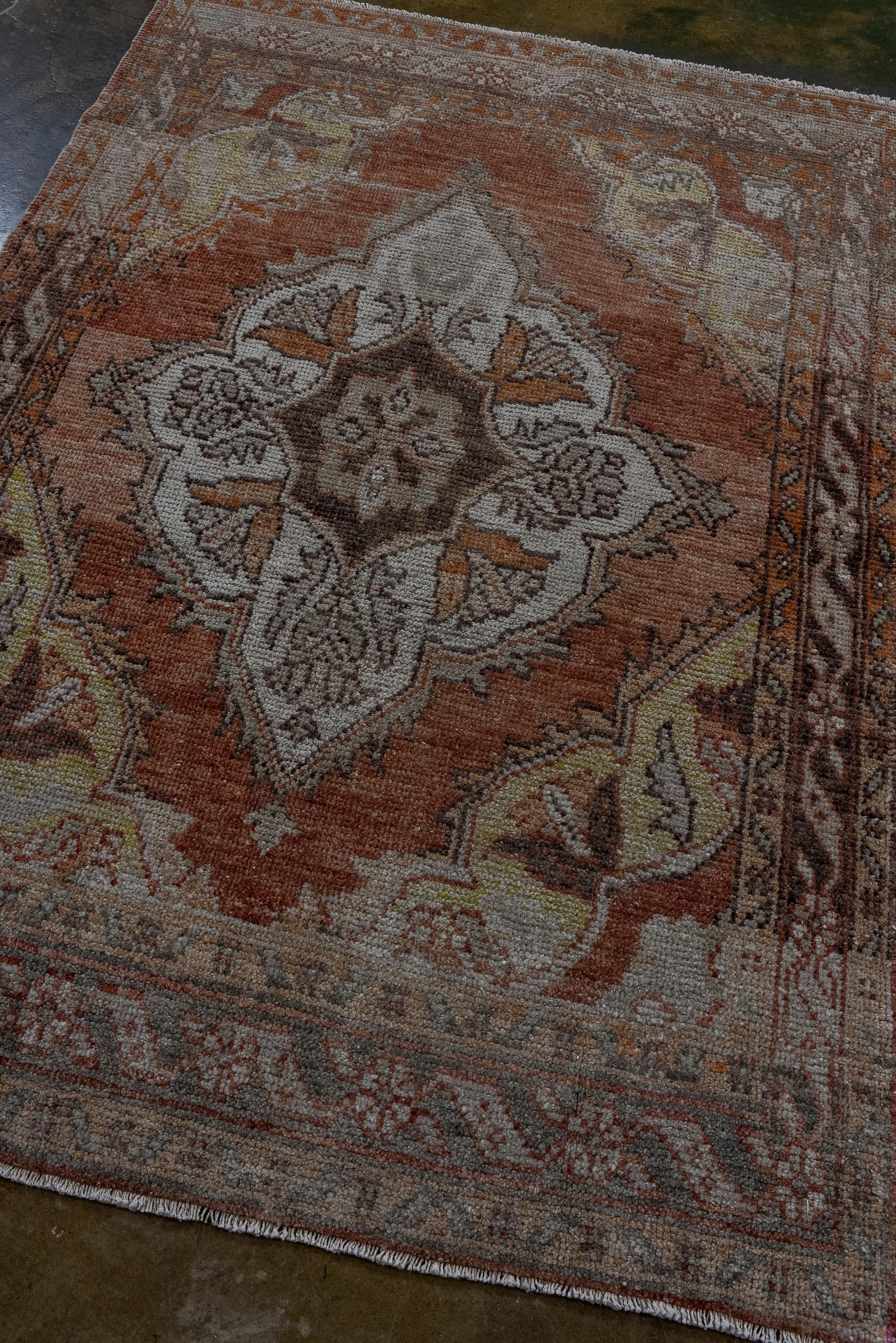 Hand-Knotted Vintage Turkish Oushak with Center Medallion and Floral Details For Sale