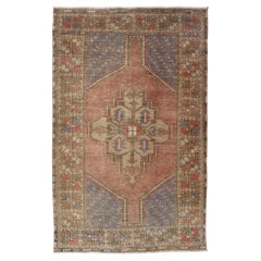 Vintage Turkish Oushak with Geometric Motifs Filled with A Medallion