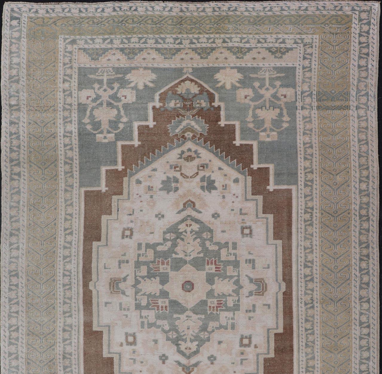 Vintage Turkish Oushak with Medallion in Taupe, Lt. Brown, Grey Blue, & Tan In Good Condition For Sale In Atlanta, GA