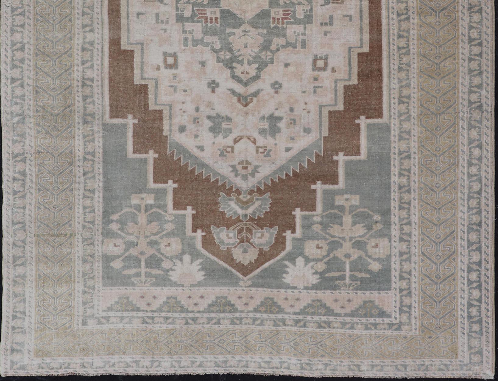 Wool Vintage Turkish Oushak with Medallion in Taupe, Lt. Brown, Grey Blue, & Tan For Sale