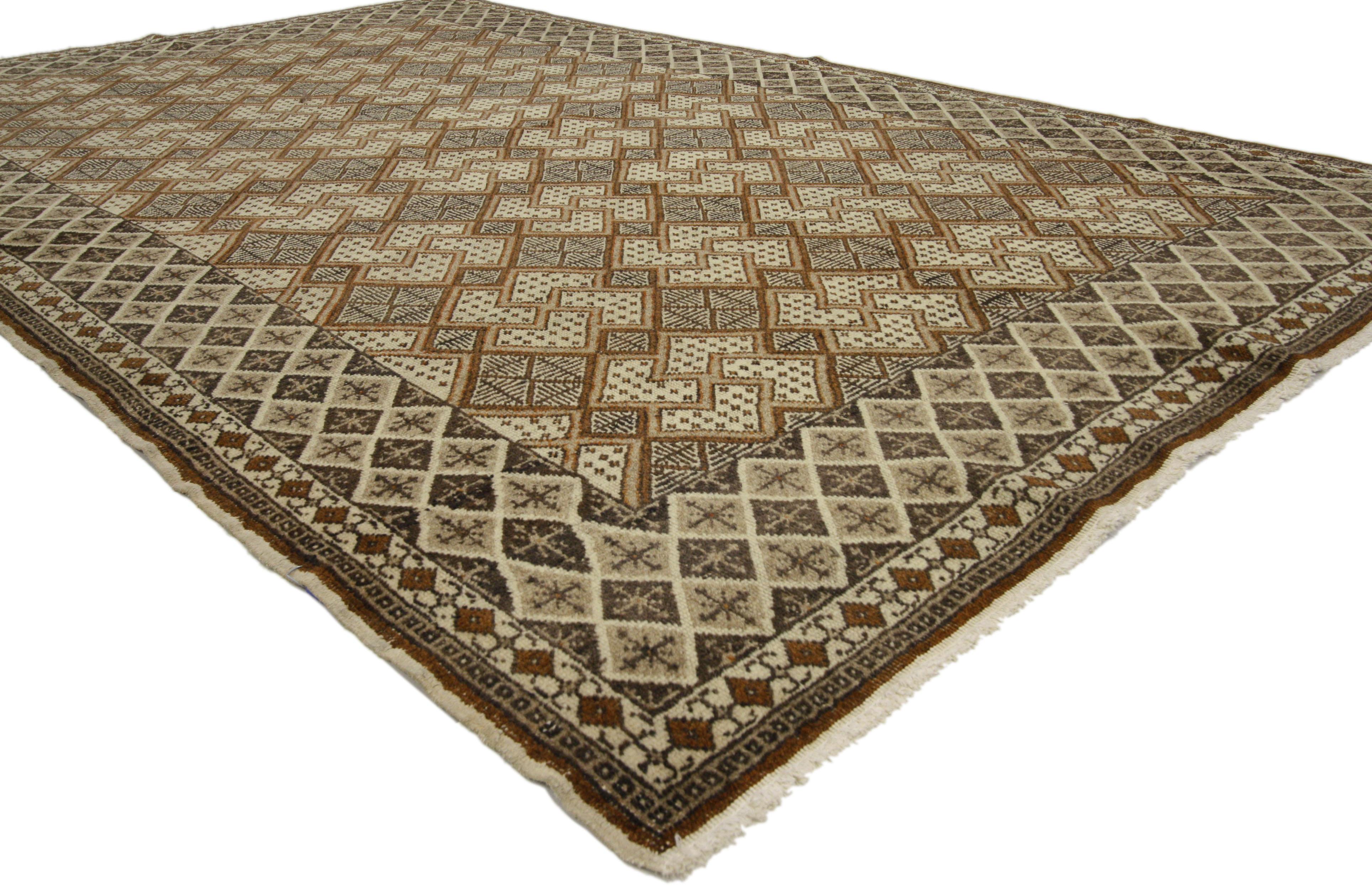 50069 Vintage Turkish Oushak with Mid-Century Modern Style. This hand-knotted wool vintage Turkish Oushak rug with Mid-Century Modern style features an all-over geometric pattern. The modest field tastefully complements the main border. The