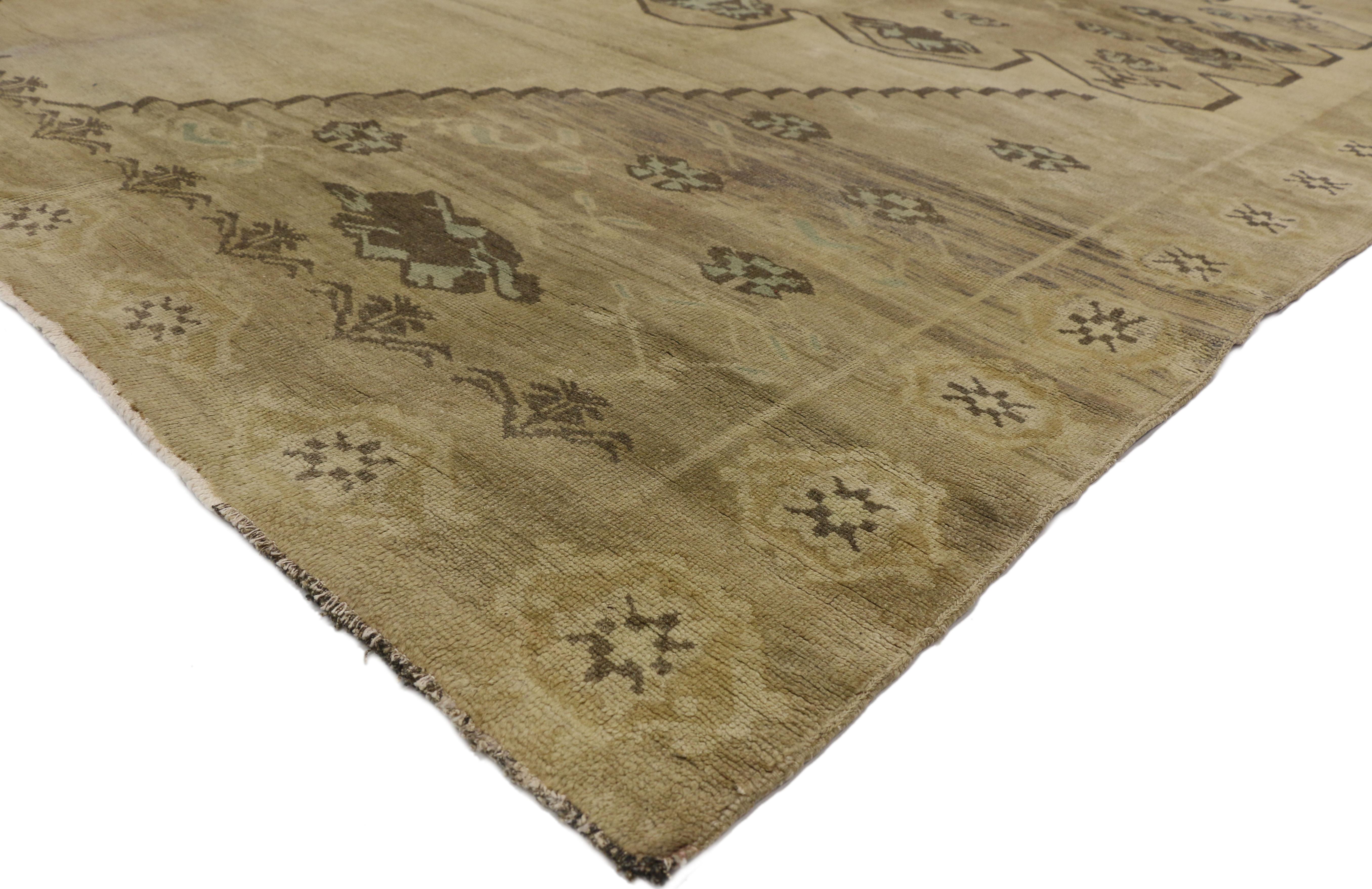 51372 Vintage Turkish Oushak Rug with Mid-Century Modern Style 10'05 x 12'10. Effortless beauty and simplicity meet soft, bespoke vibes with Mid-Century Modern style in this hand-knotted wool vintage Turkish Oushak rug. The abrashed field features a