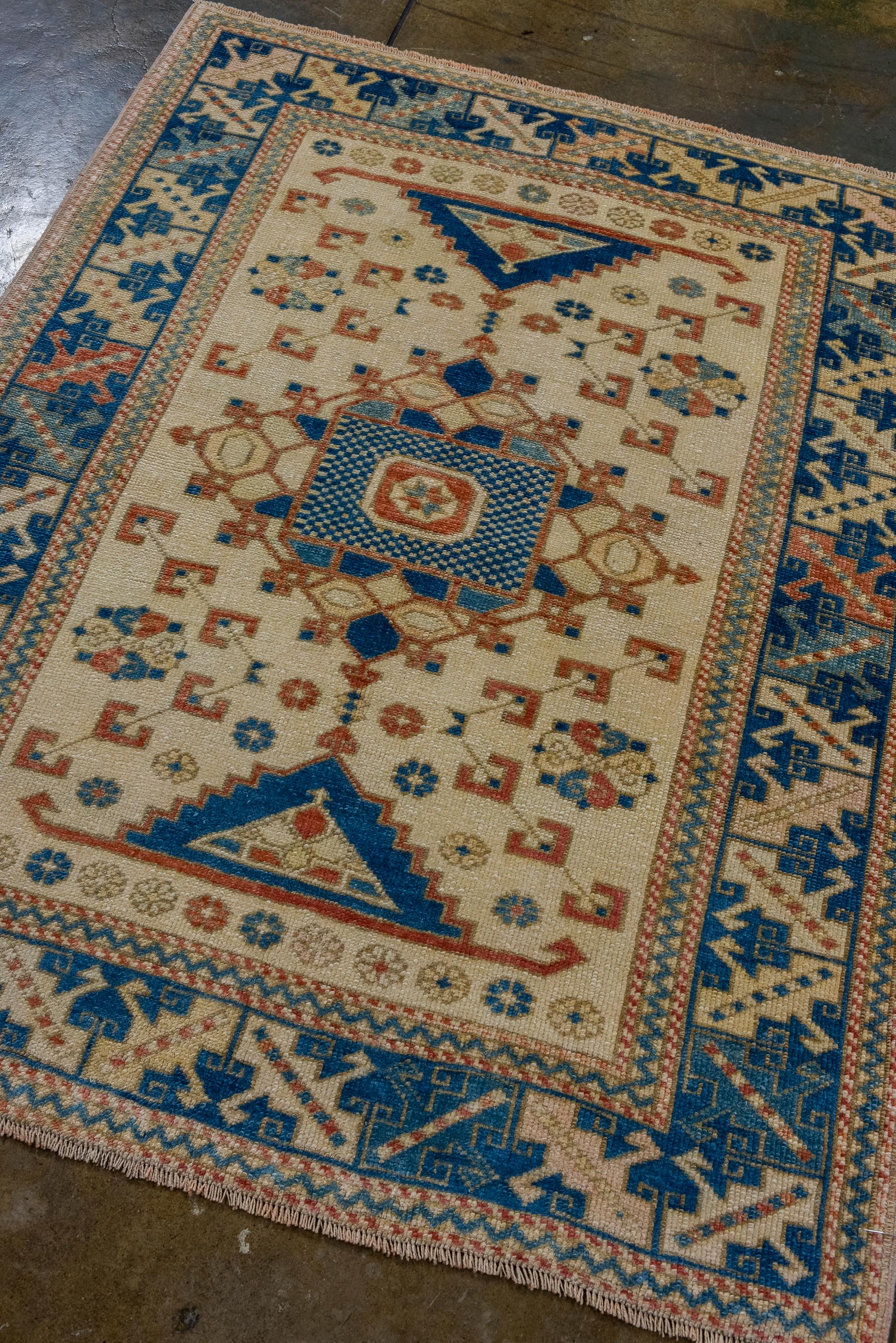 Hand-Knotted Vintage Turkish Oushak with Modern Ecru Field and Blue Design For Sale