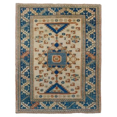 Oushak turco d'epoca con campo ecrù moderno e design blu