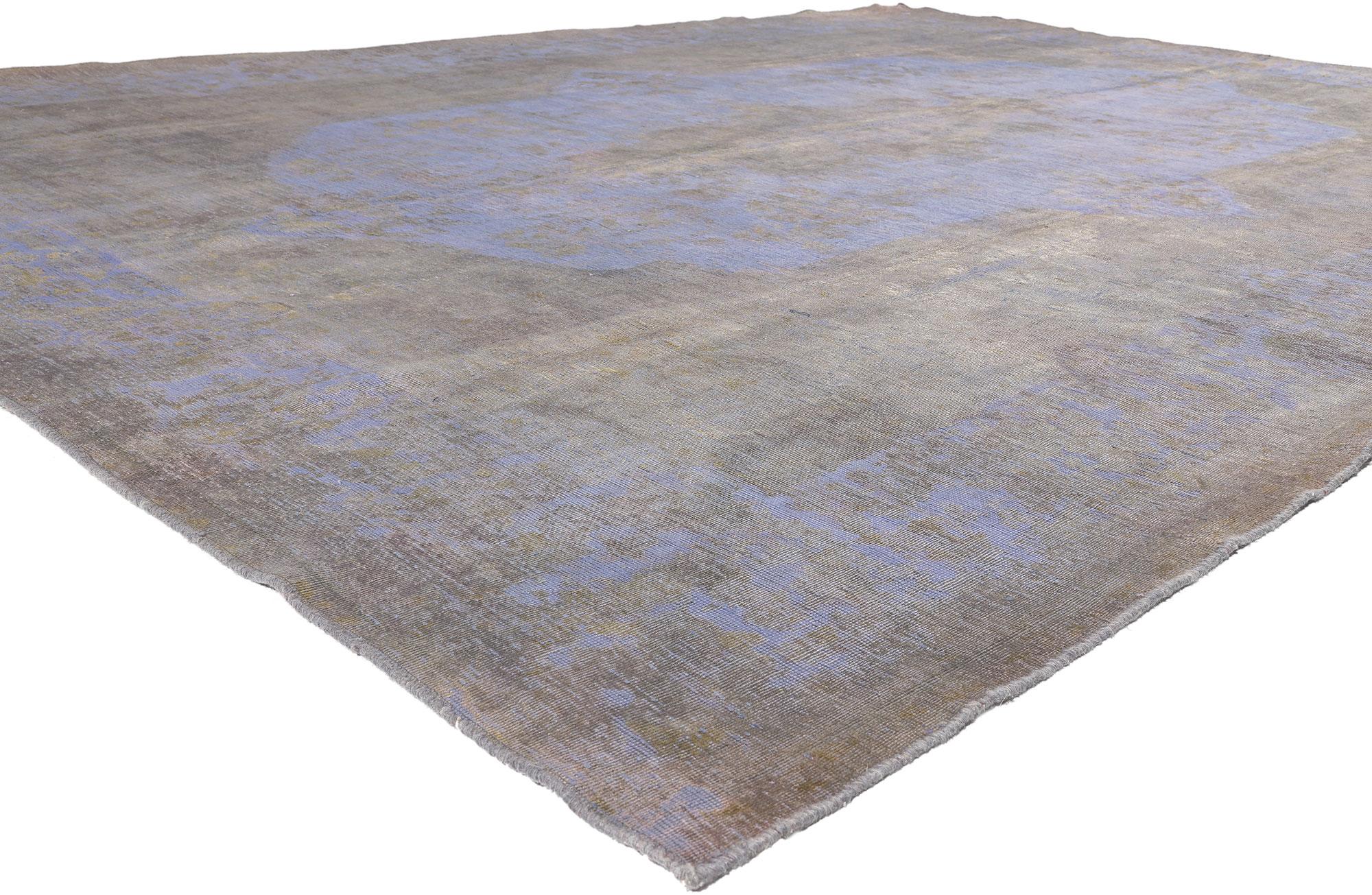 60784 Vintage Turkish Overdyed Rug, 09’06 x 12’10. 
Combing a timeless design with chromatic brilliancy, this hand-knotted wool distressed vintage Turkish overdyed rug beautifully embodies an Industrial French style with Boho Chic vibes. It features