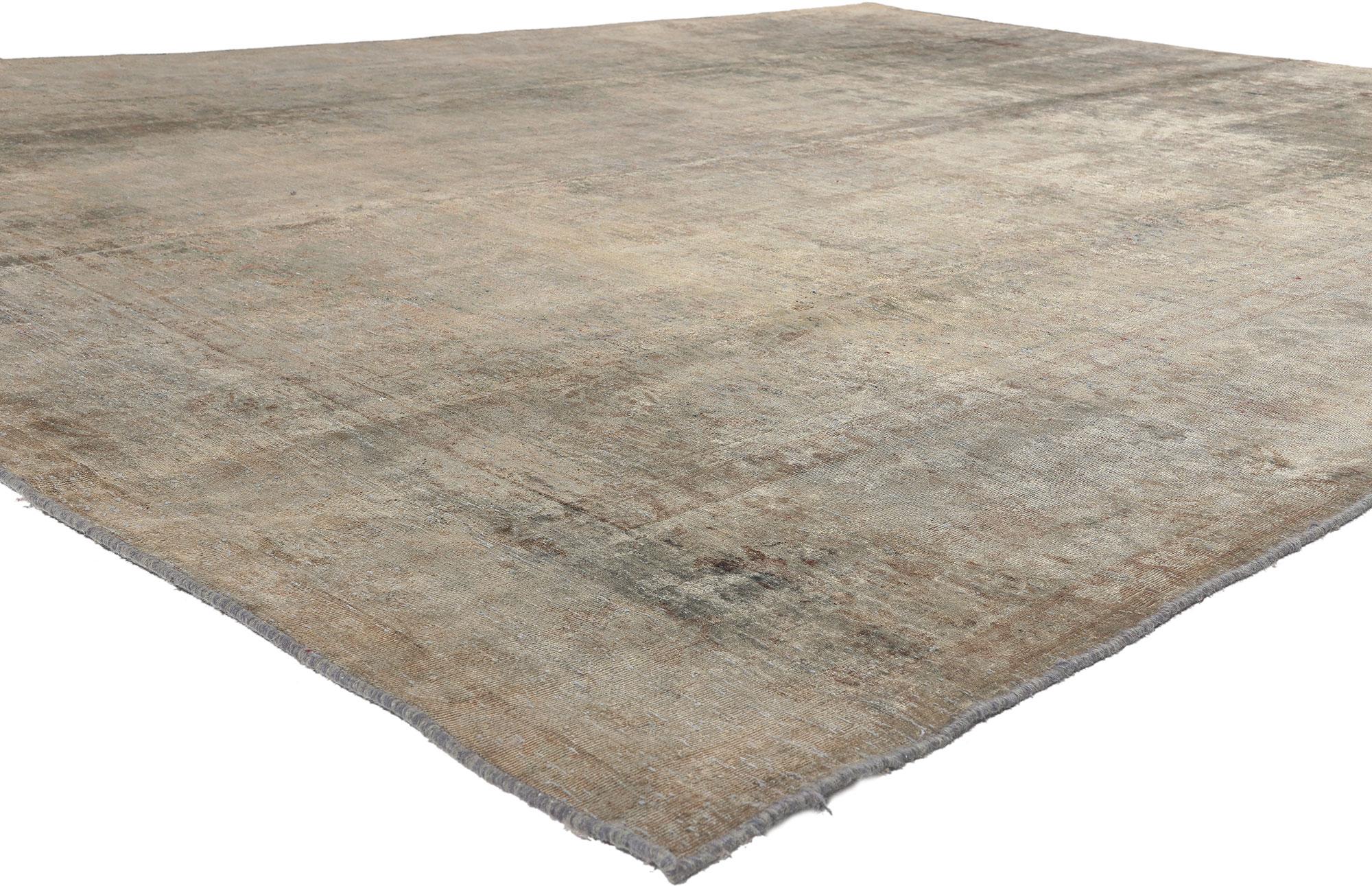 60611 Vintage Turkish Overdyed Rug, 09'08 x 12'08. 
​Step into a realm where Modern Industrial flirts effortlessly with luxe utilitarian charm, embodied in the threads of this hand-knotted wool vintage Turkish overdyed rug. Let's dissect the styles