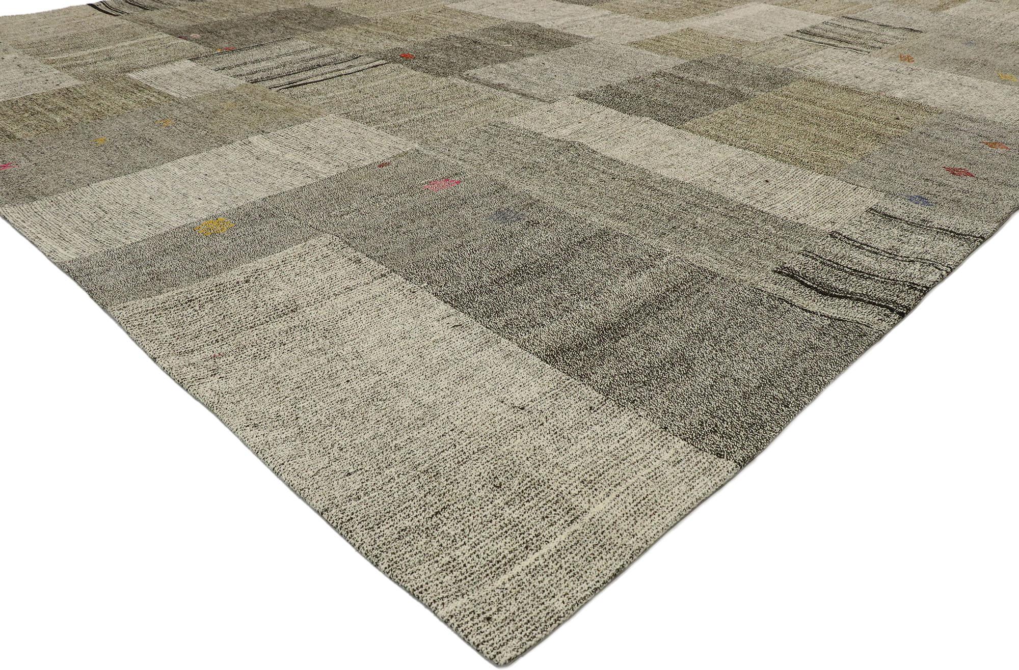 53167, vintage Turkish Patchwork Kilim rug with Scandinavian Modern style. Featuring well-balanced asymmetry with a simple design aesthetic, this handwoven Turkish Patchwork Kilim rug adds texture and subtle graphic appeal forming a warm, relaxed
