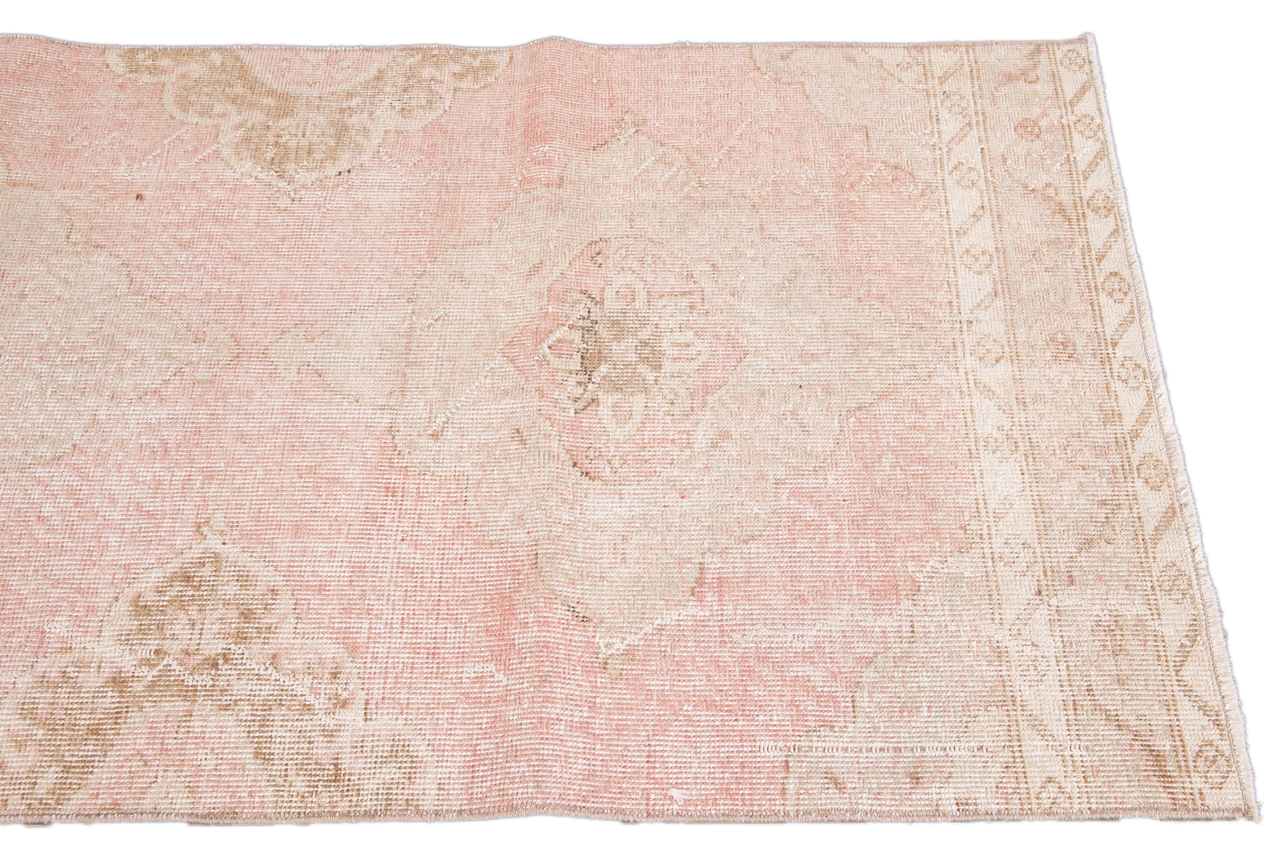 Hand-Knotted Vintage Turkish Pink and Beige Handmade Medallion Floral Wool Runner For Sale
