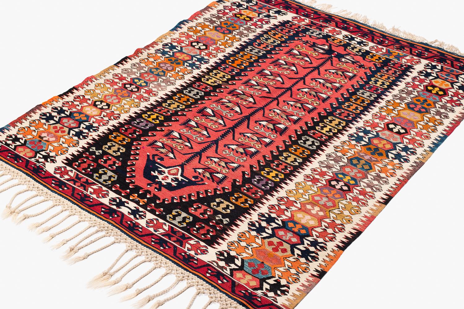 This prayer kilim is approximately 40-50 years old and was made with the highest quality materials. This rug is woven very tightly using Fine yarn and is stunning condition. It would be great either on the floor or as a wall hanging. Measures: