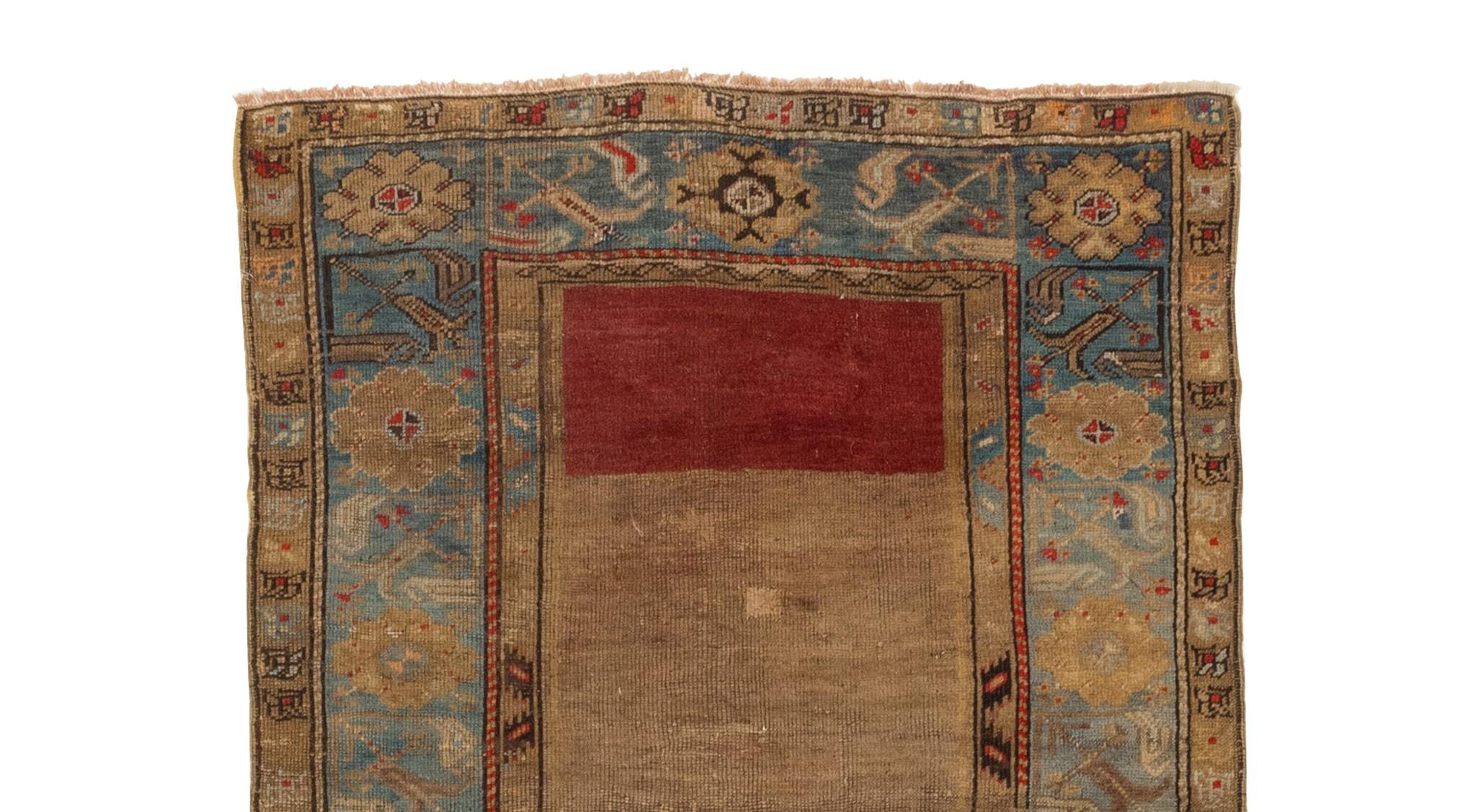 This exquisite Turkish prayer rug, adorned with enchanting floral motifs, is a true masterpiece of traditional craftsmanship and artistic expression. Handwoven with meticulous attention to detail, it showcases the skilled artistry and cultural