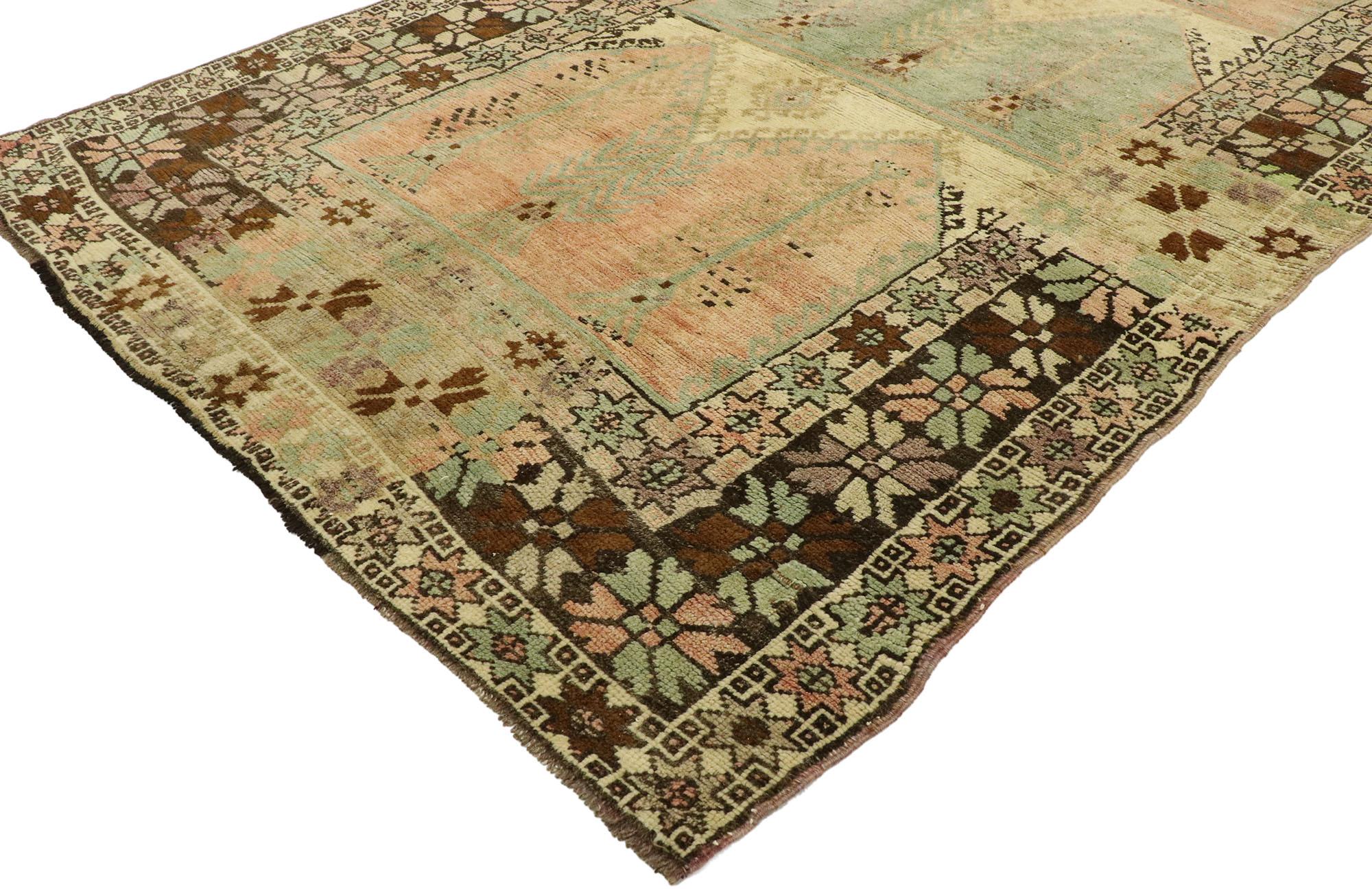 53100, vintage Turkish Prayer Saph rug with Mid-Century Modern style. Time-softened colors and Mid-Century Modern style collide in this hand knotted vintage Anatolian Saph rug. The Directional Turkish prayer rug beautifully displays alternating