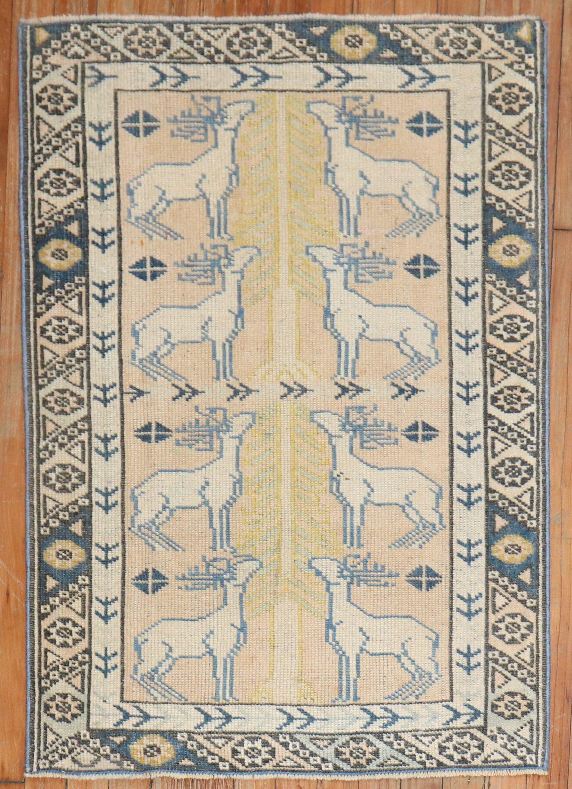 Late 20th-century Turkish Anatolian Pictorial rug with 8 jolly full Reindeers.

Measures: 2'5'' x 3'7''.
