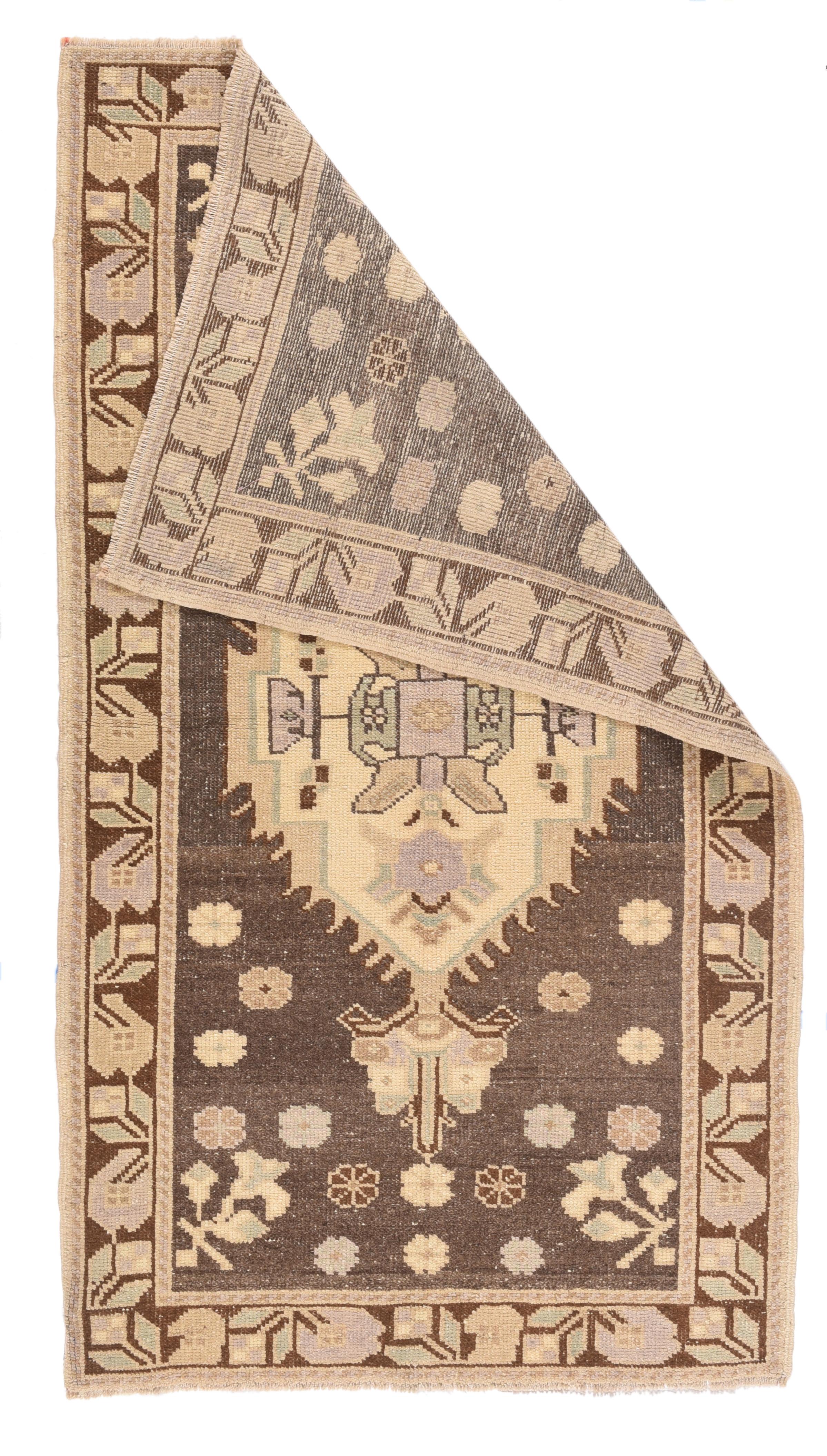 Vintage Turkish rug. Measures: 3.3'' x 5.9''.