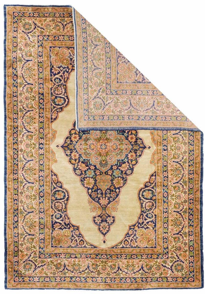 Vintage Turkish Rug 5'3'' x 7'8''. This medium-weave scatter shows a Tabriz-influenced layout with a cream-sand open field centred by a full-height royal blue scalloped palmette-filled medallion with en suite escutcheon palmettes. Royal blue corners