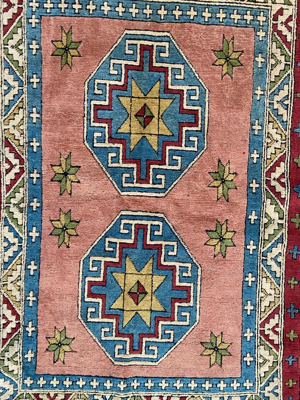 Nice late 20th century Turkish rug with a beautiful geometrical Kazak style design and beautiful colors, entirely hand knotted with wool velvet on wool foundation.