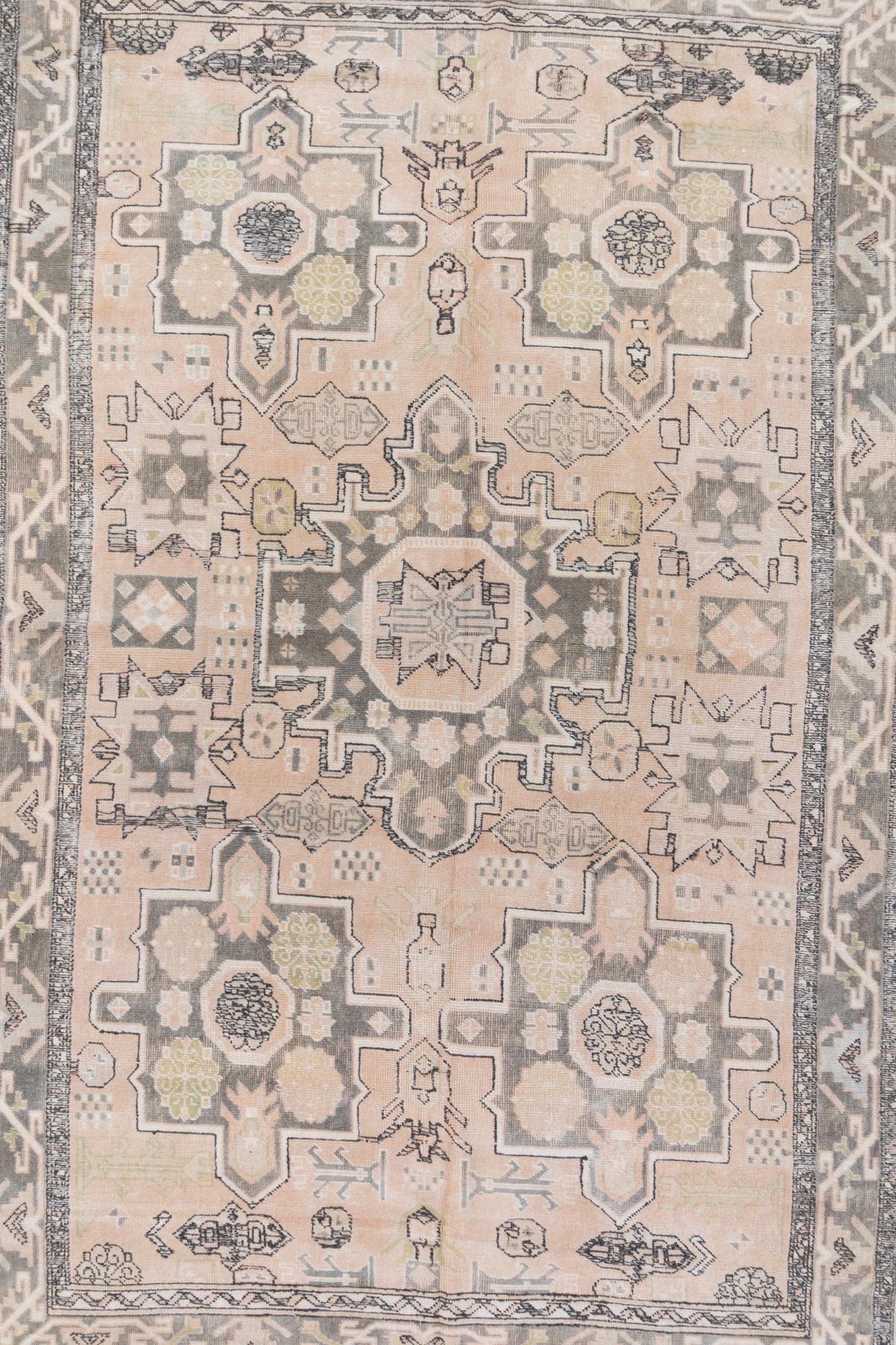 This hand woven vintage Turkish rug has a subtle patina and lovely pastel colorway.

Wear Guide: 2

Wear notes:
Vintage and antique rugs are by nature, pre-loved and may show evidence of their past. There are varying degrees of wear to vintage