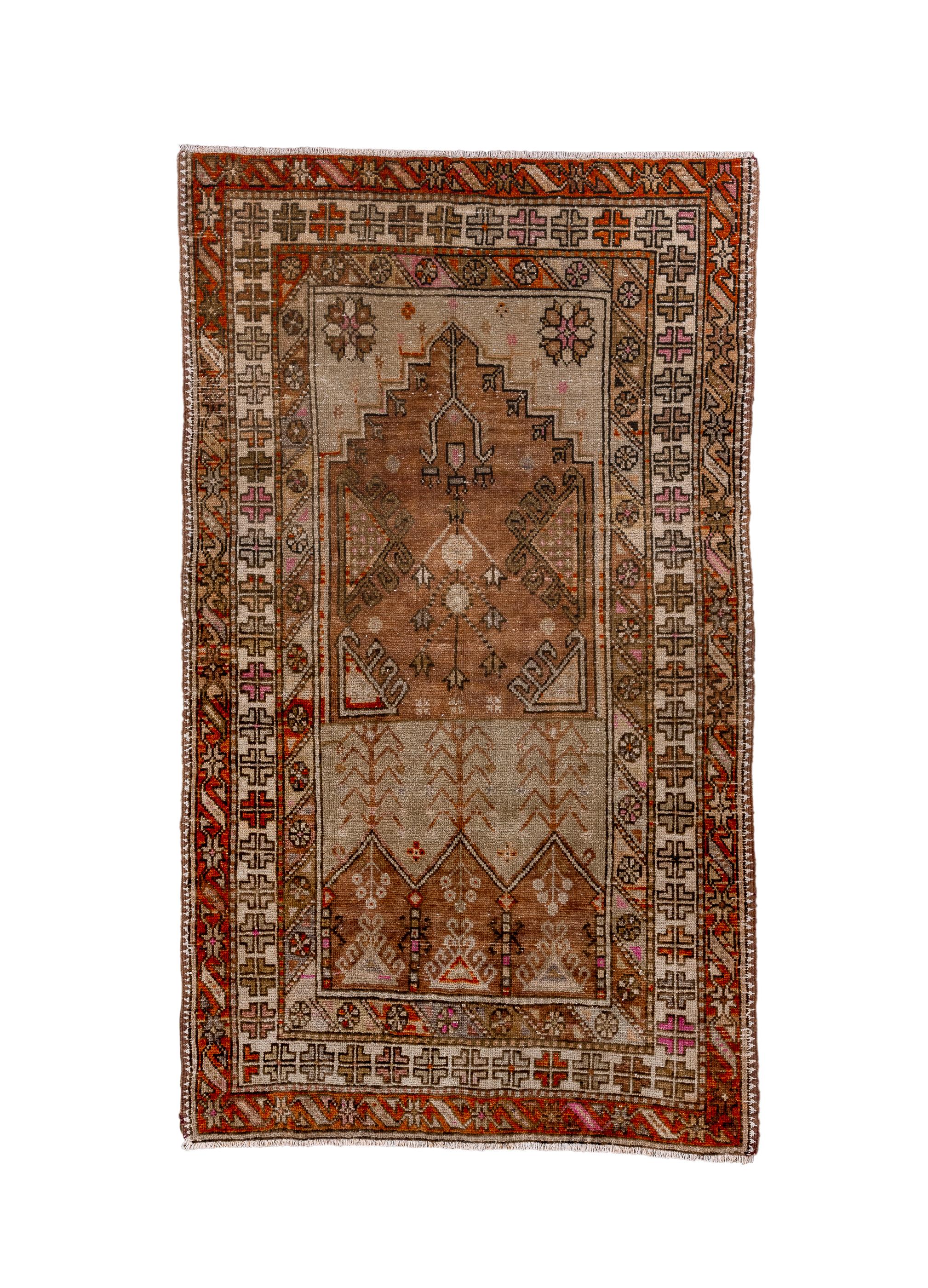 This Central Anatolian prayer layout scatter shows  a stepped red niche field ornamented by triangles,  with three red lappets below and rosette patterned spandrels above. Main ecru border with sectioned  crosses, diagonally paneled inner minor and 
