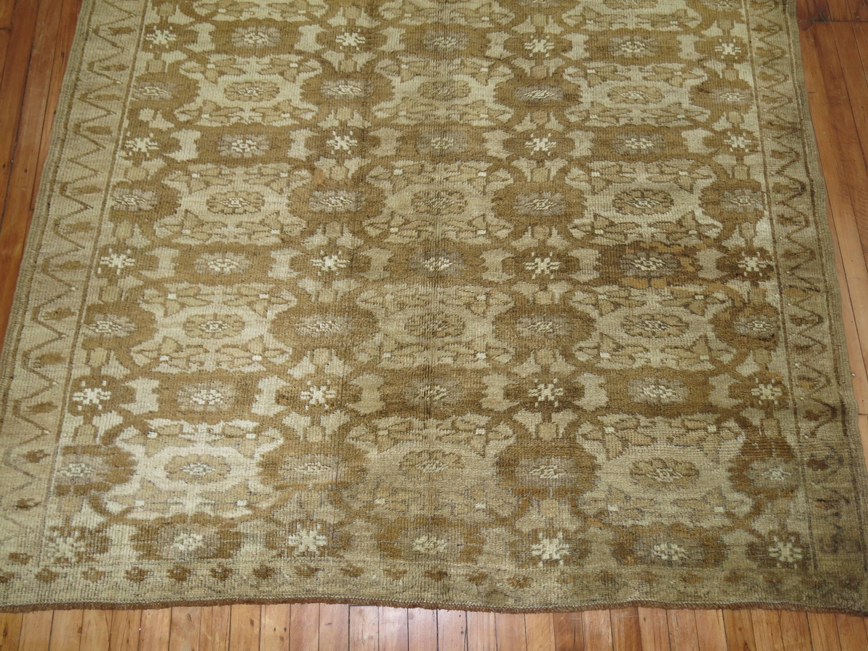 A Vintage Turkish rug in shades of brown.

6'2'' x 9'5''


