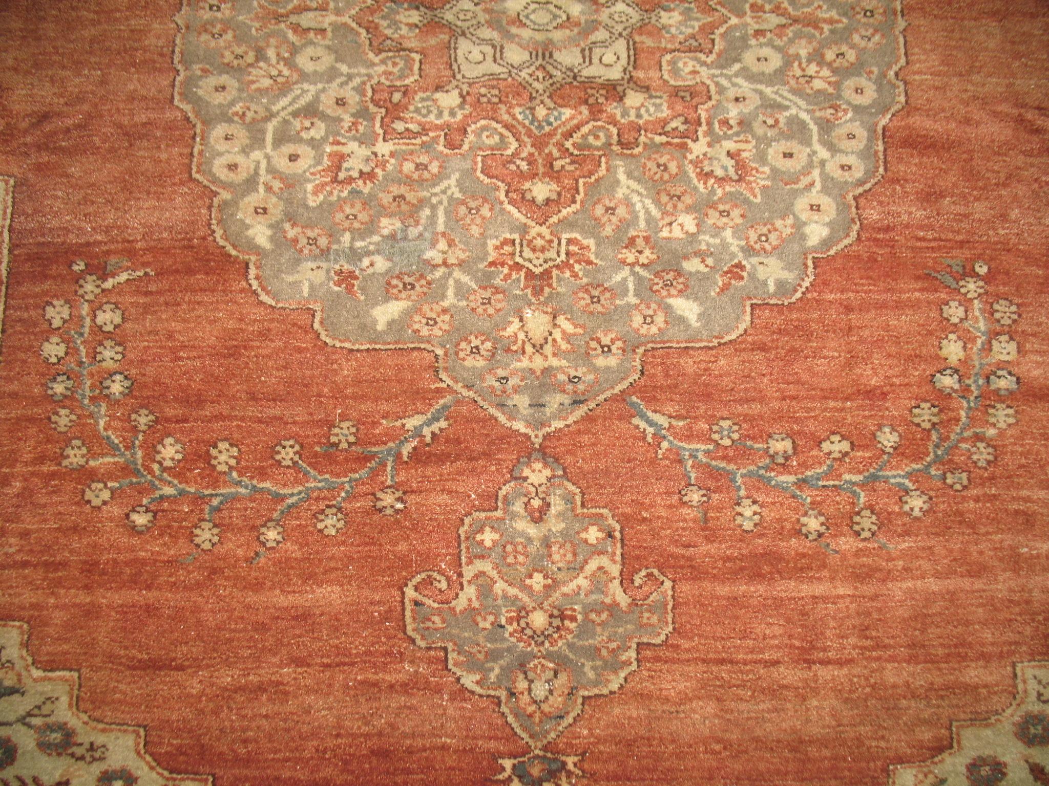 One of a kind room size Turkish rug with a traditional oriental design in gray, apricot, and ivory tones

Measures: 8'9'' x 10'9''.
