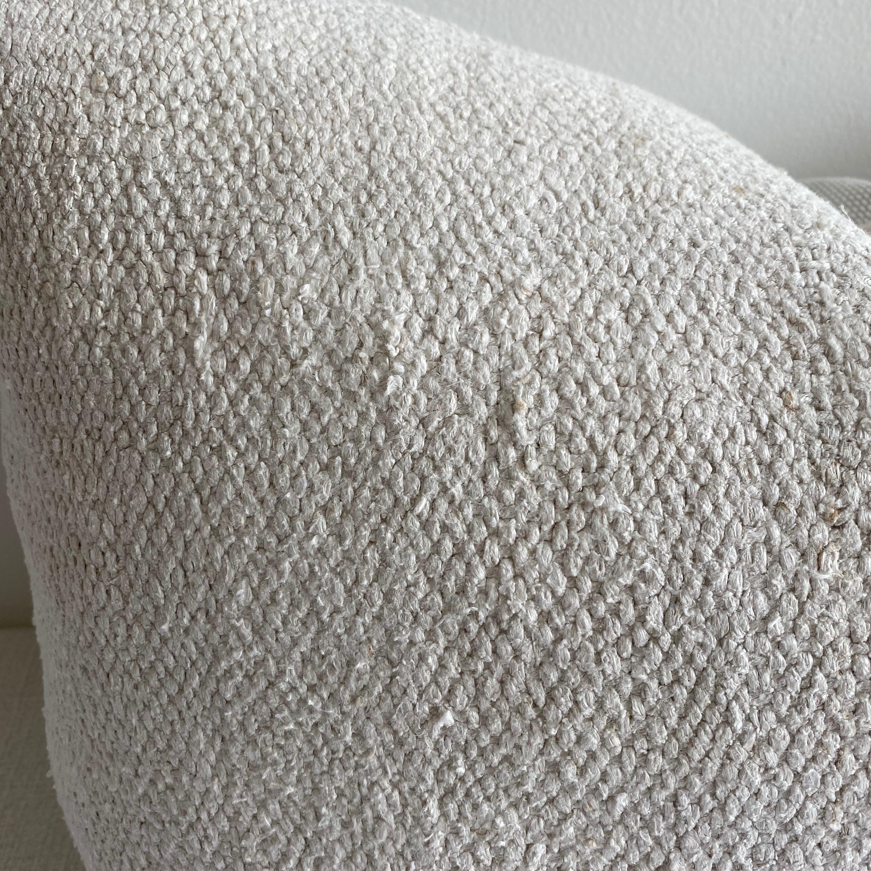 Unique pillow has been made with a Turkish rug, in multiple white tones, and some variations of white woven through. The face is fully lined, with a coordinating backing in a solid fabric, and hidden zipper closure.
Spot cleaning is recommended, or