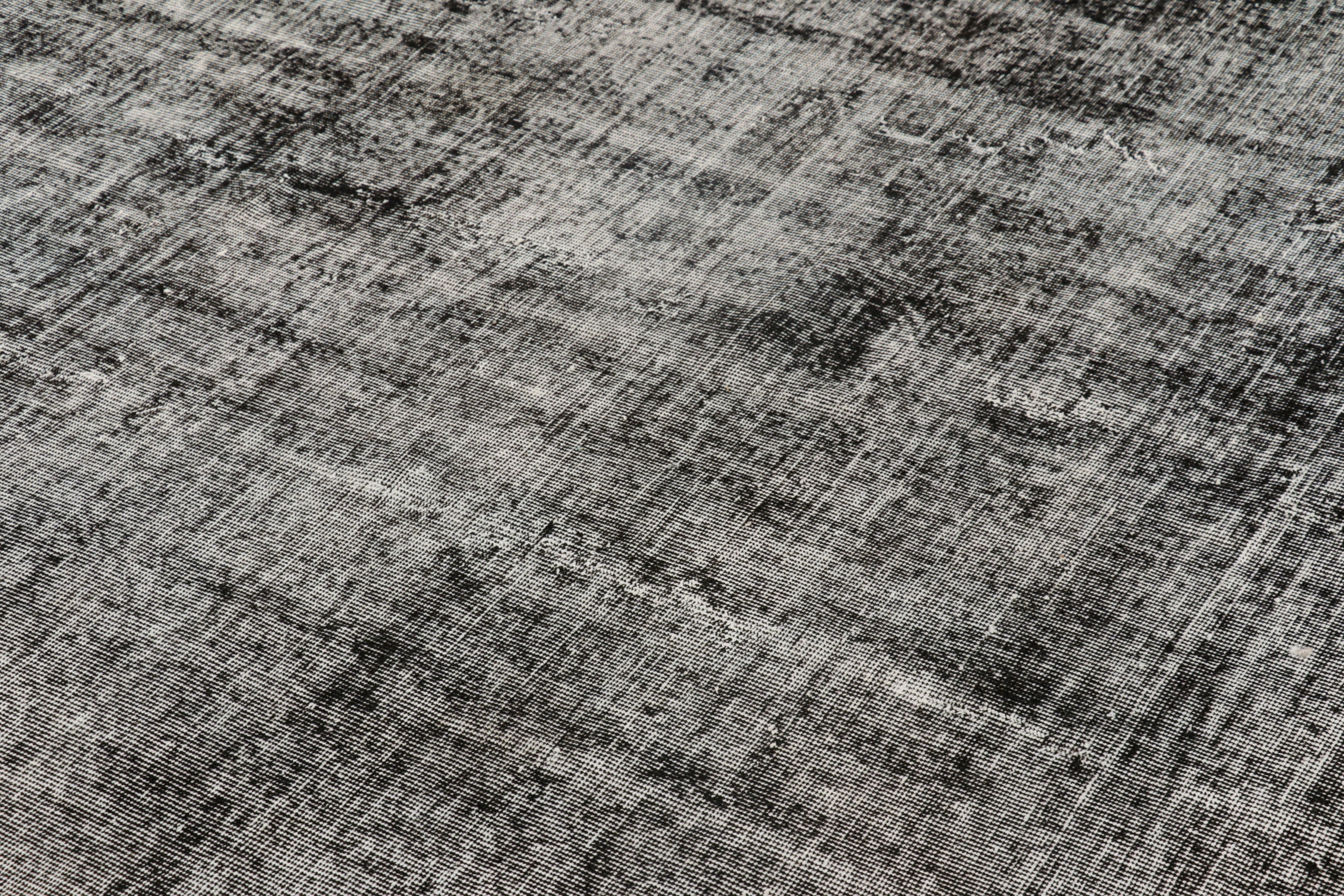 Hand-knotted in wool, this 5x8 vintage Turkish rug is from that collection of mid-century rugs with antique washes giving them that old-world, almost distressed look to them.  

On the Design: 

Connoisseurs will admire this personal vintage piece